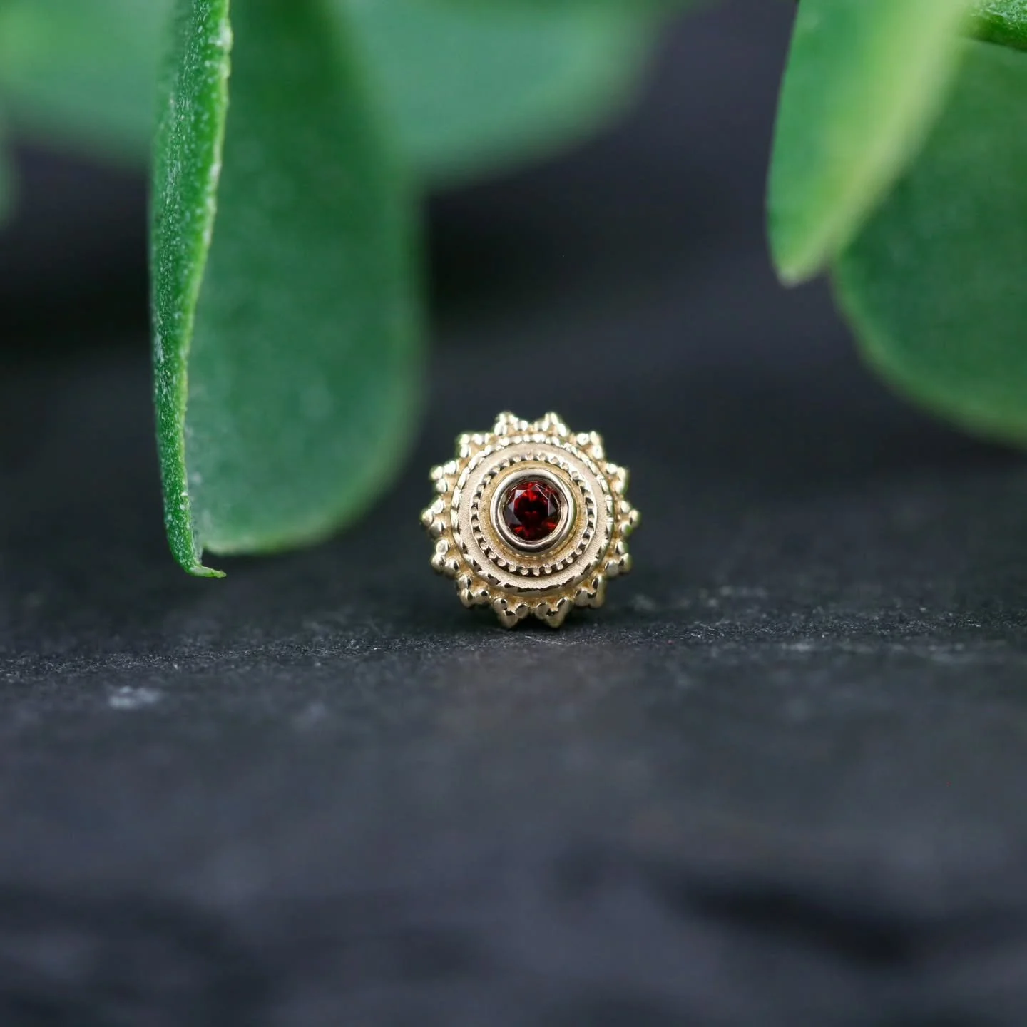 I'm going to manifest autumn weather with this collection of BVLA jewelry. The deep red garnet, golden tones with tsavorite, and rich orange of Mexican fire opal are going to hold me over until the weather and leaves catch up 🍁

#safepiercing @bvlal