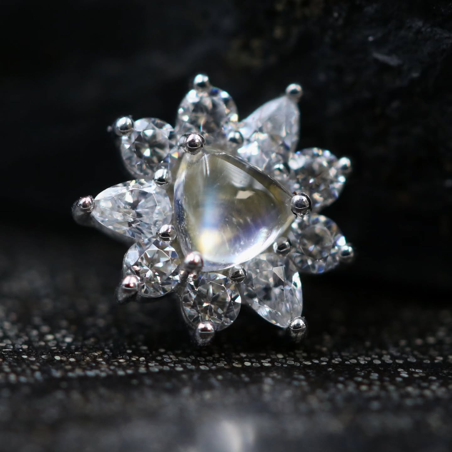 It feels like time for rainbow moonstone set in white gold, and @emberbodyjewelry delivered beautifully 😍 check out the flash in those stones living up to their name 🌈 

These pieces are part of a custom curation, but if you love what you see we ca