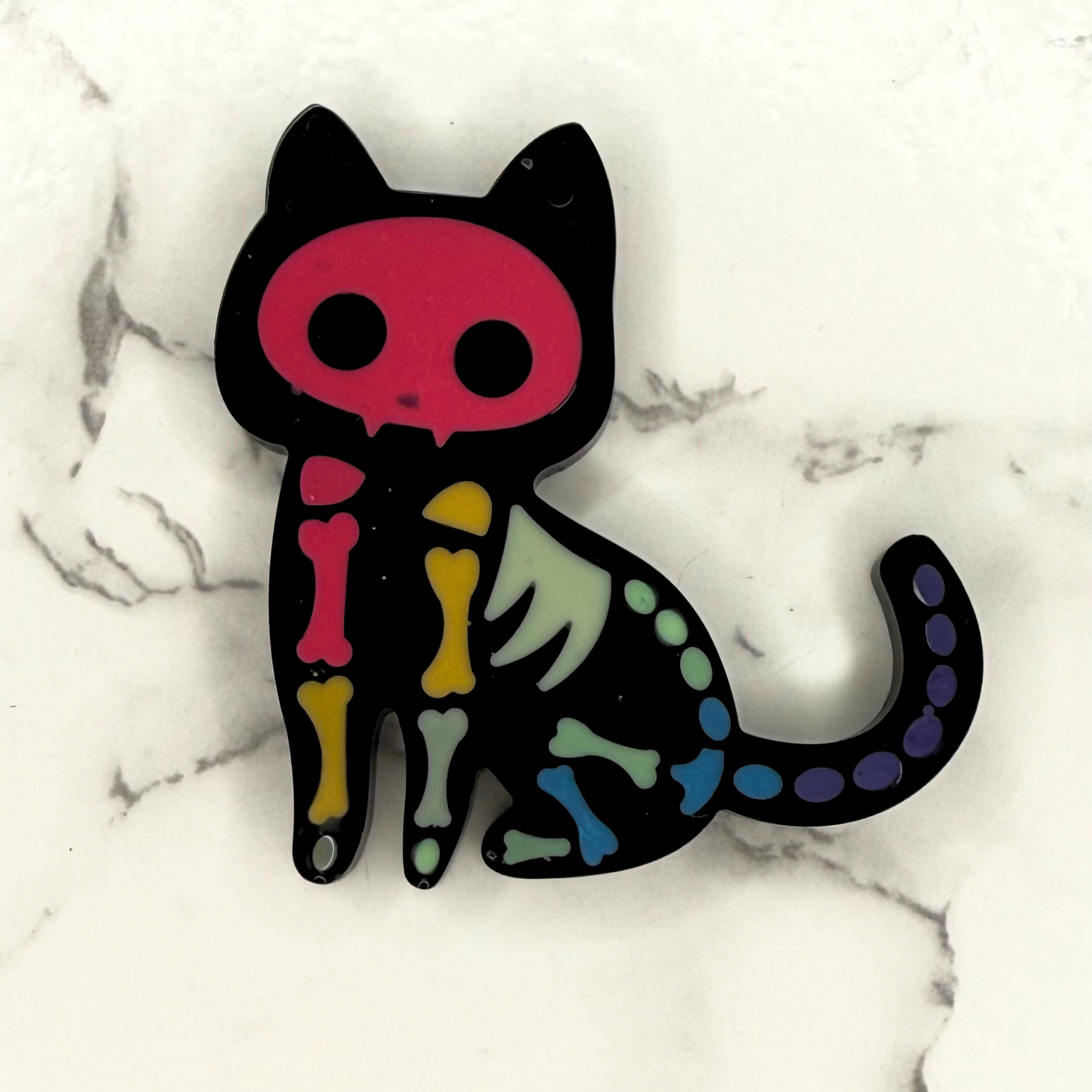 These resin cat skeleton keychains are all handmade and one of a kind—just like real cats, they refuse to be identical. The way the resin settles gives each one its own personality, whether it’s a ghostly translucent feline or a vibrant, colorful lit