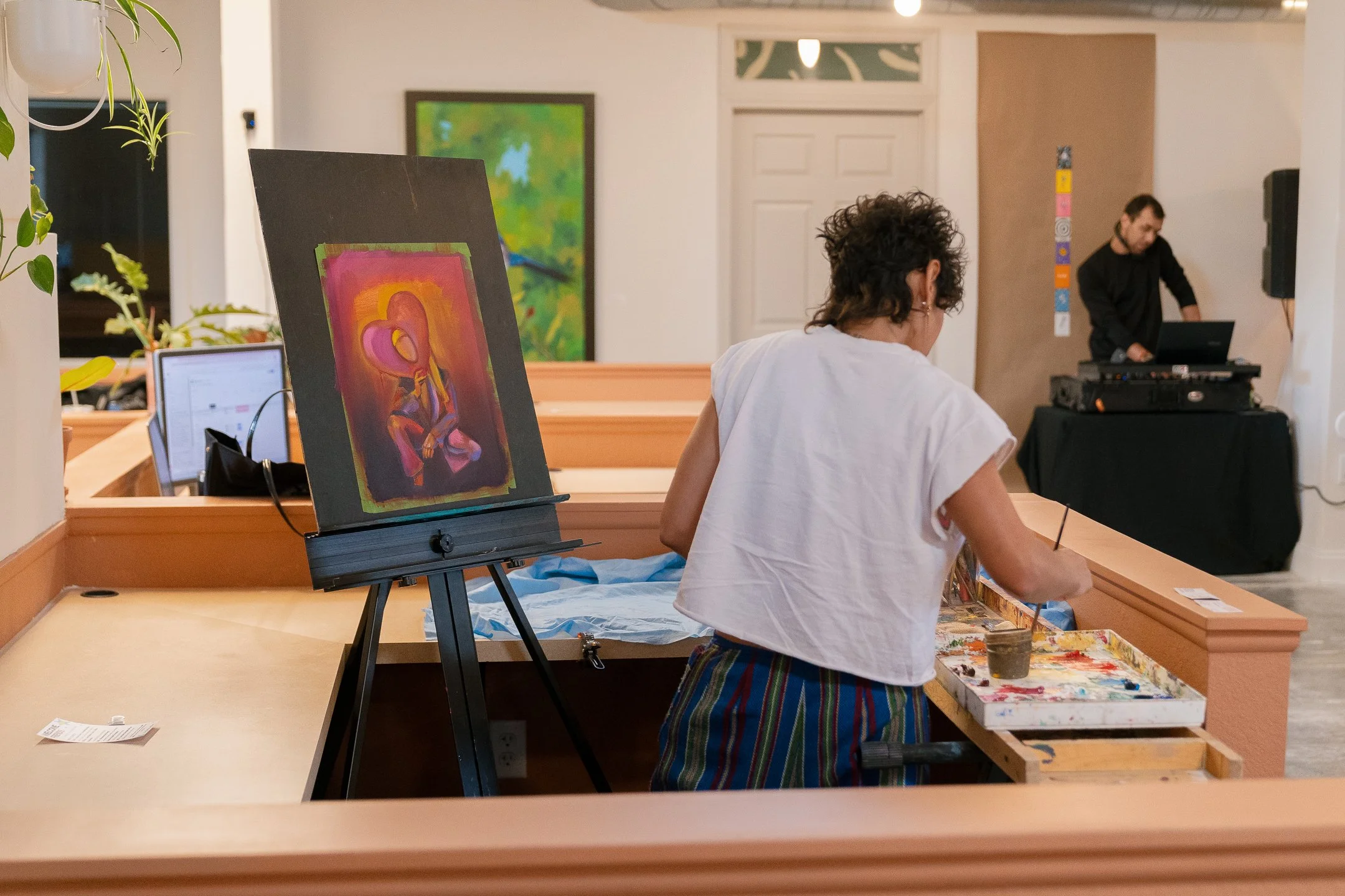 artist painting Ybor Hive
