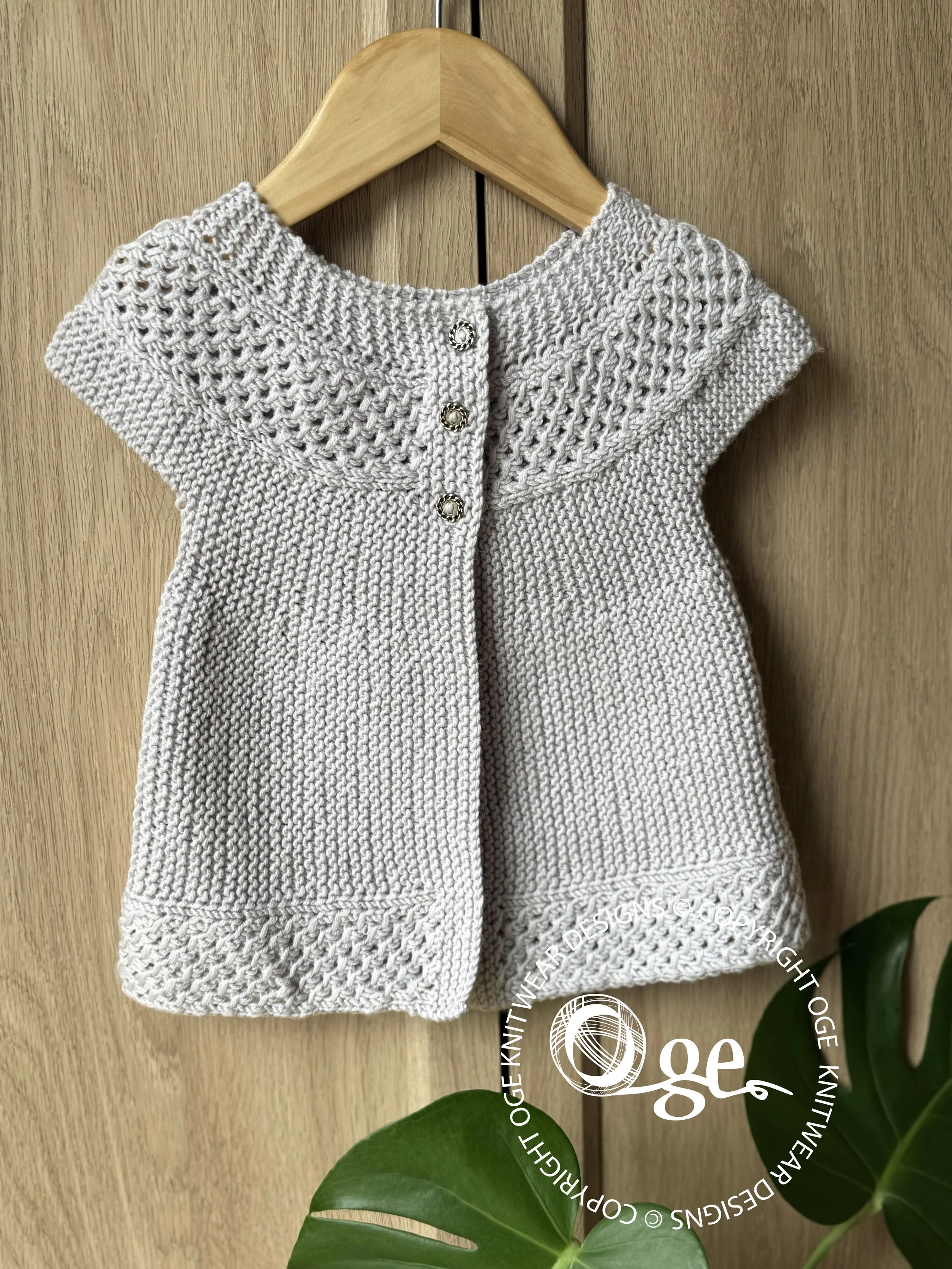 p057.4.jpgKNITTING PATTERN -- Baby Angel Top - P057