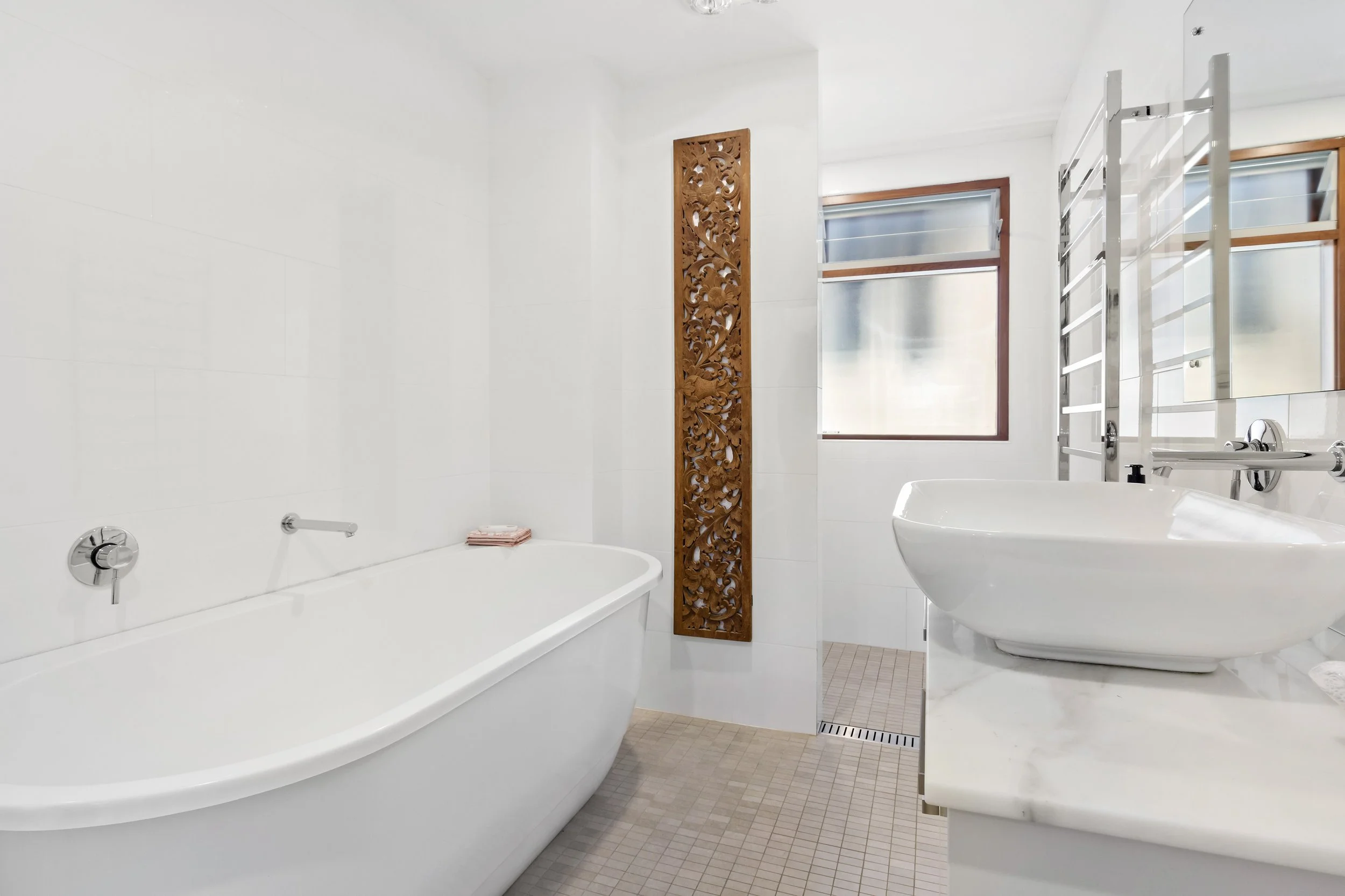 A bathroom inside 17 Curry Street. A luxurious three story residence designed and constructed by Arcbuild's in-house design team.