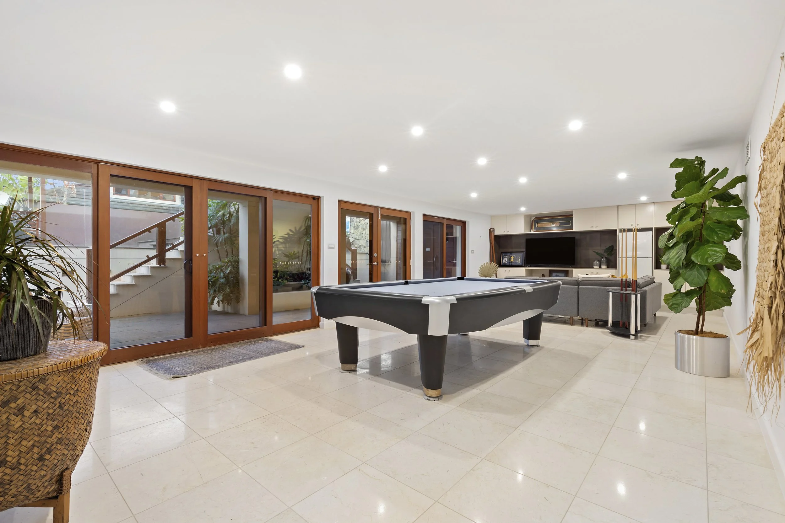 Games room area inside 17 Curry Street. A luxurious three story residence designed and constructed by Arcbuild's in-house design team.