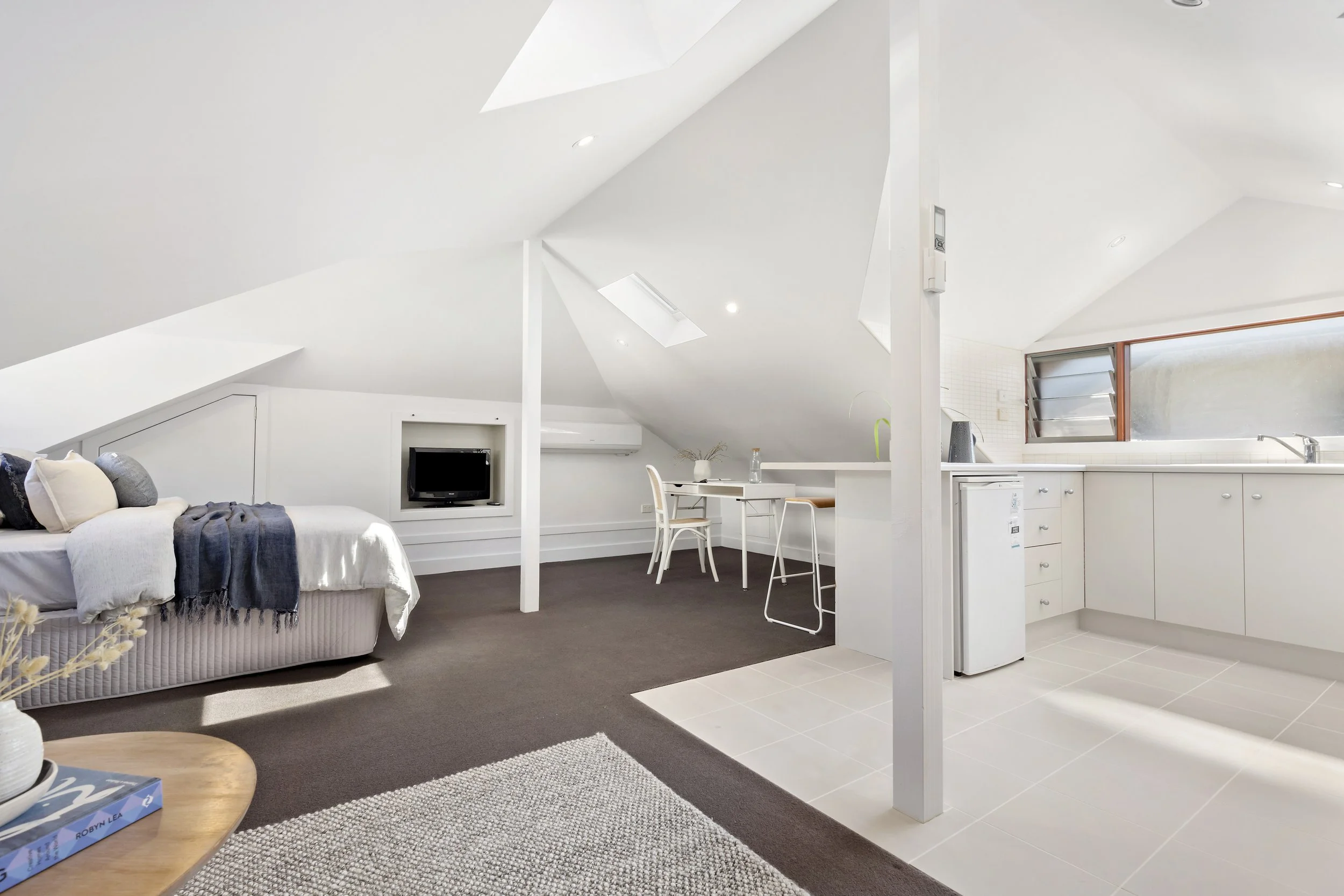 A bedroom inside 17 Curry Street. A luxurious three story residence designed and constructed by Arcbuild's in-house design team.