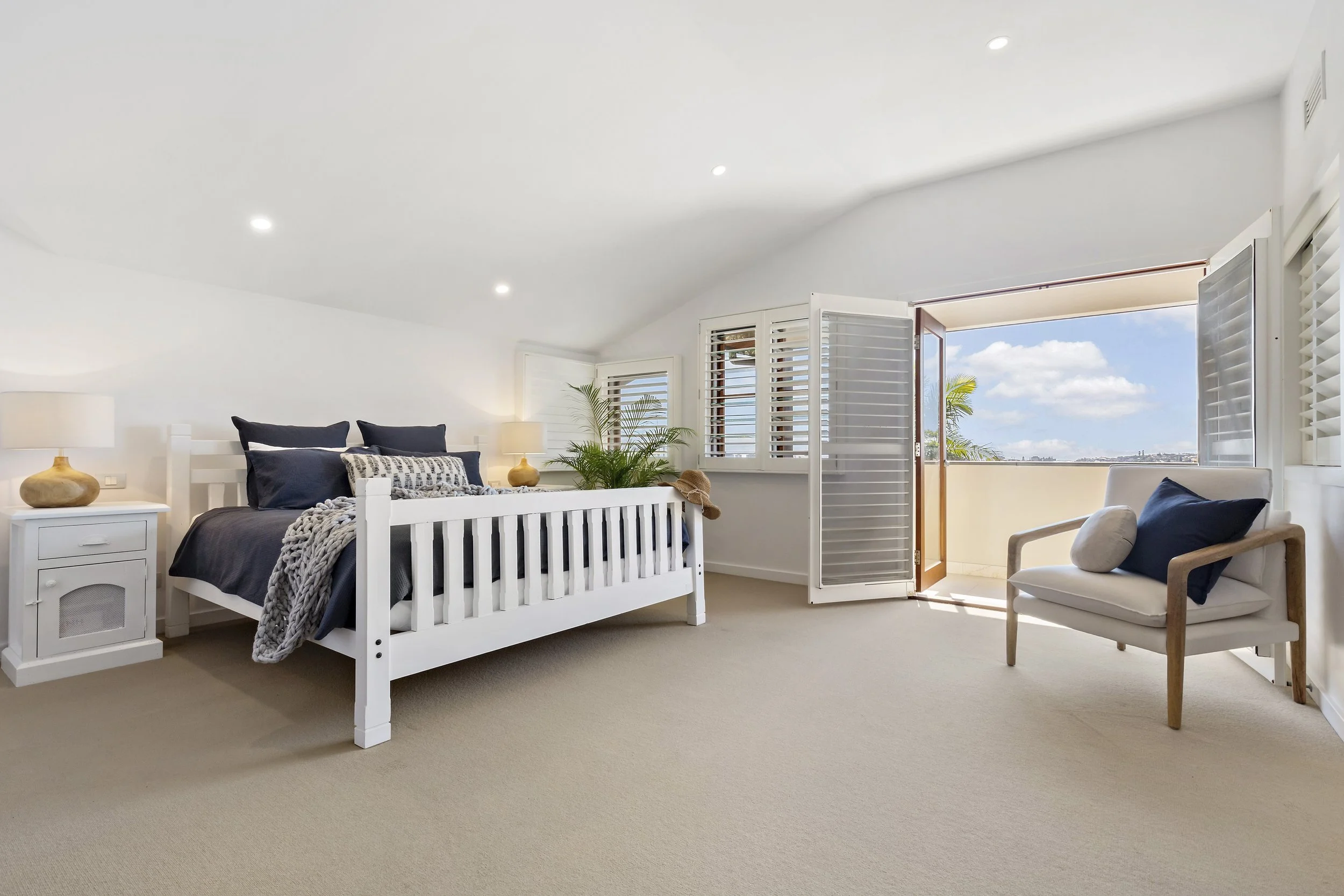 A bedroom inside 17 Curry Street. A luxurious three story residence designed and constructed by Arcbuild's in-house design team.