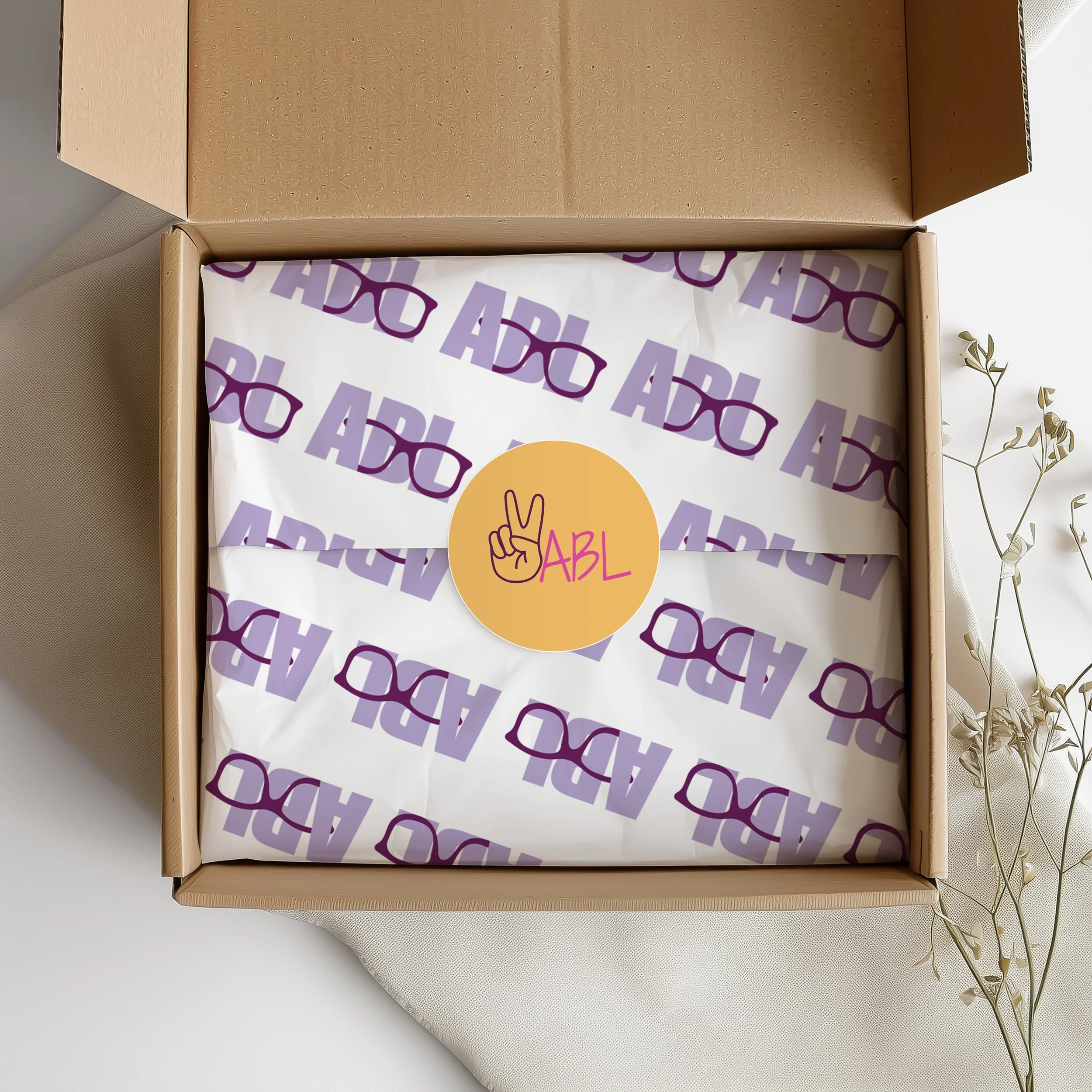 AB Legal Tissue Paper Mockup with Sticker.jpg