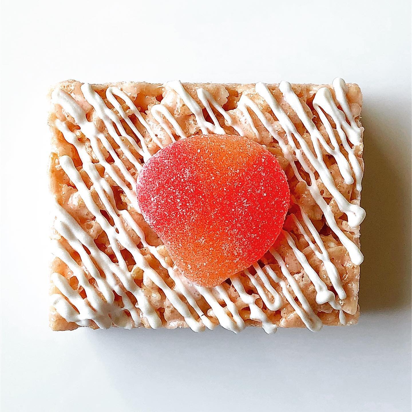PEACHES AND CREAM RICE CRISPIE TREAT &mdash; July Featured Flavor # 2

Getting a jump on stone fruit season with the sweet summery taste of peaches &amp; cream

-peach flavored rice crispie treat base
-extra marshmallows 
-topped with a vanilla cream