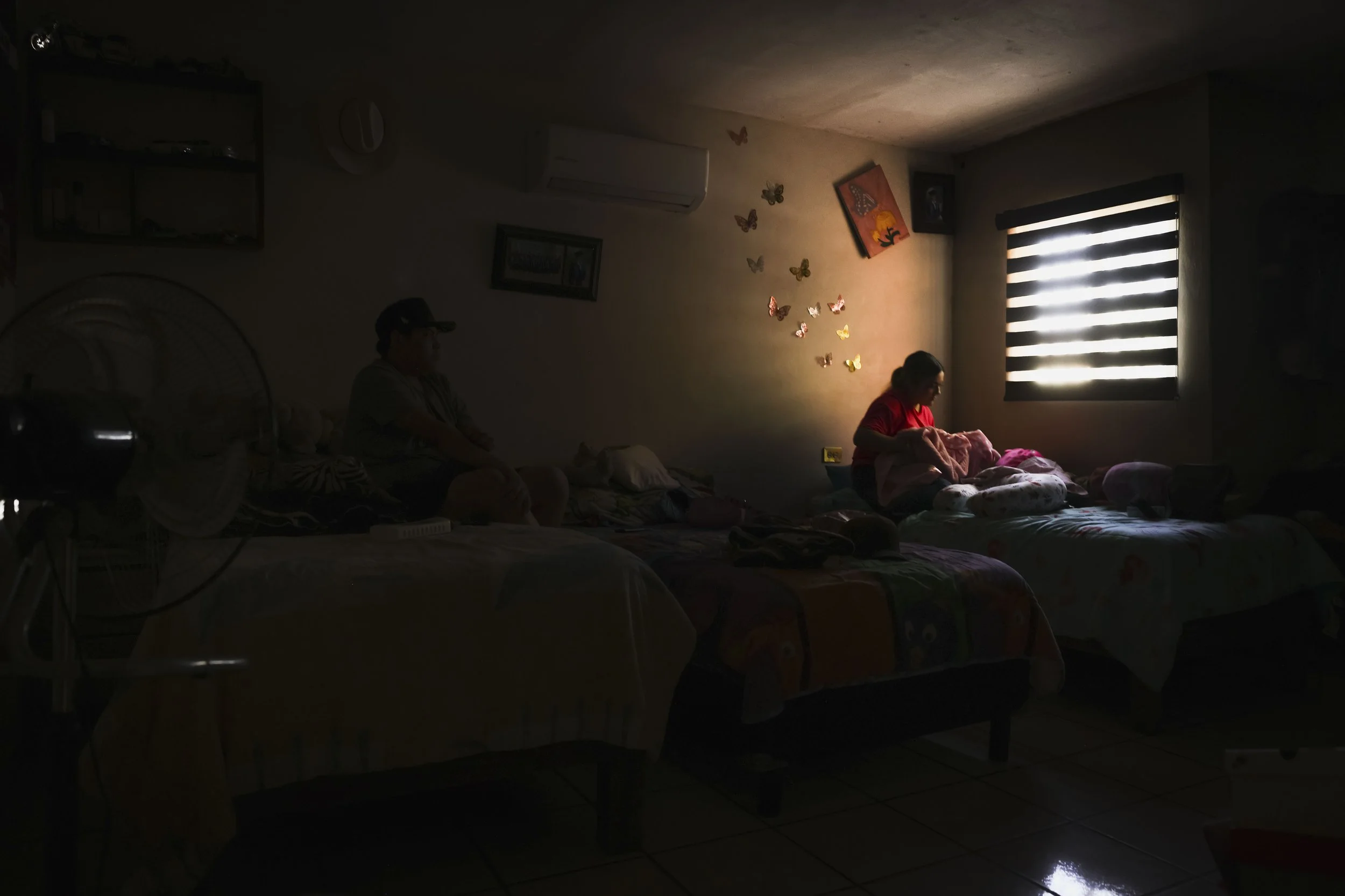 Jennifer in the family bedroom.
With her brother.