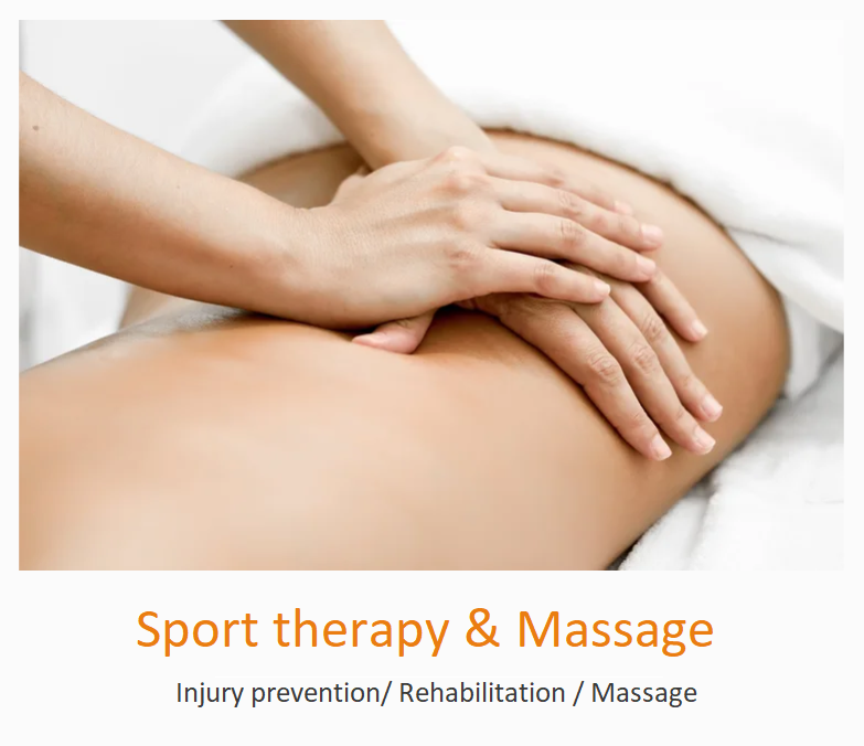 A person receiving a massage on their lower back from a massage therapist in a spa or clinic setting, with a white towel partially covering the person's body.