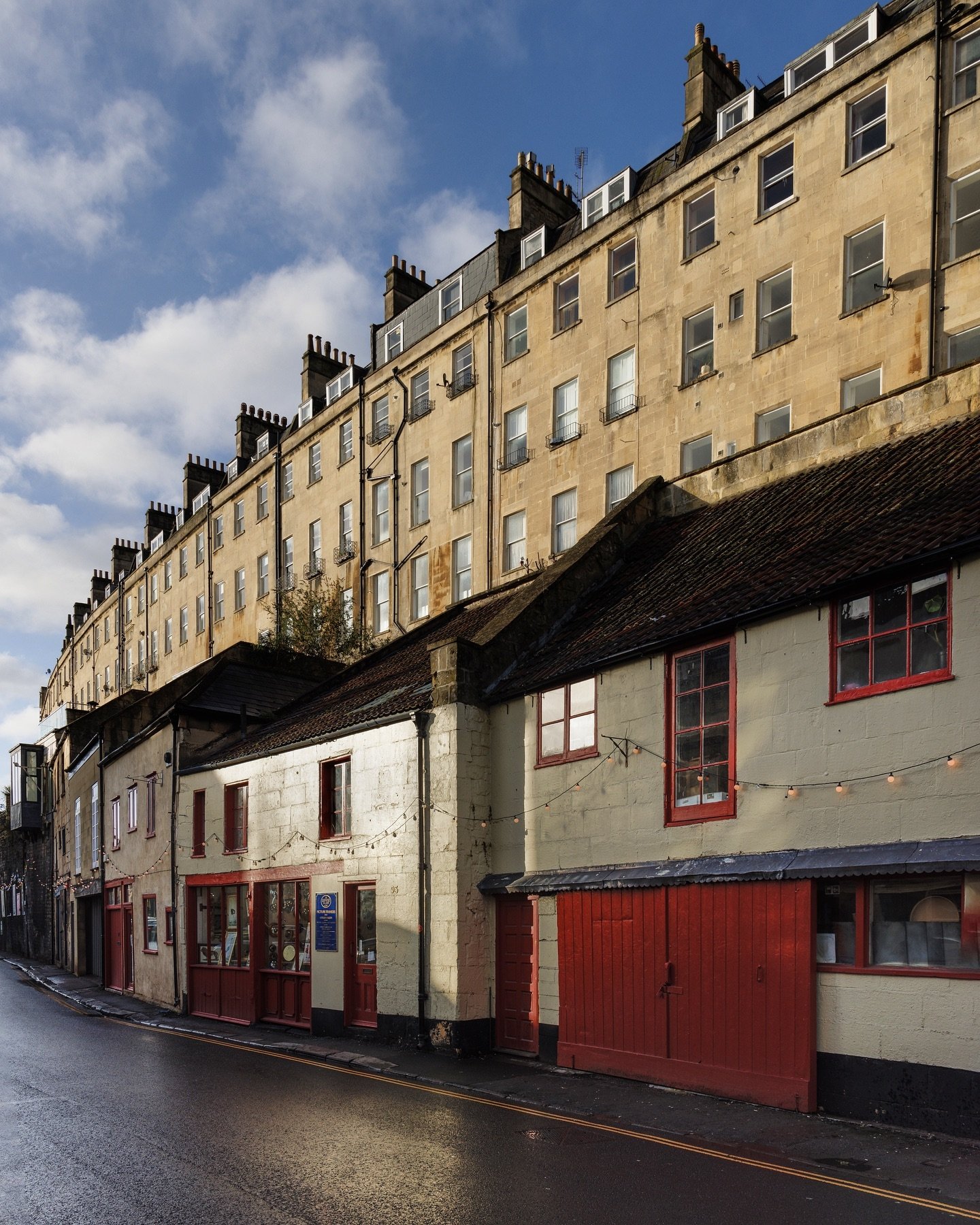 Wandering along the streets of Bath can sometimes feel like you are in two different places at once!

Walcot Street is one such discovery, it feels like a world apart from the Paragon which looms like a mighty Georgian sentinel above. Made up of a co