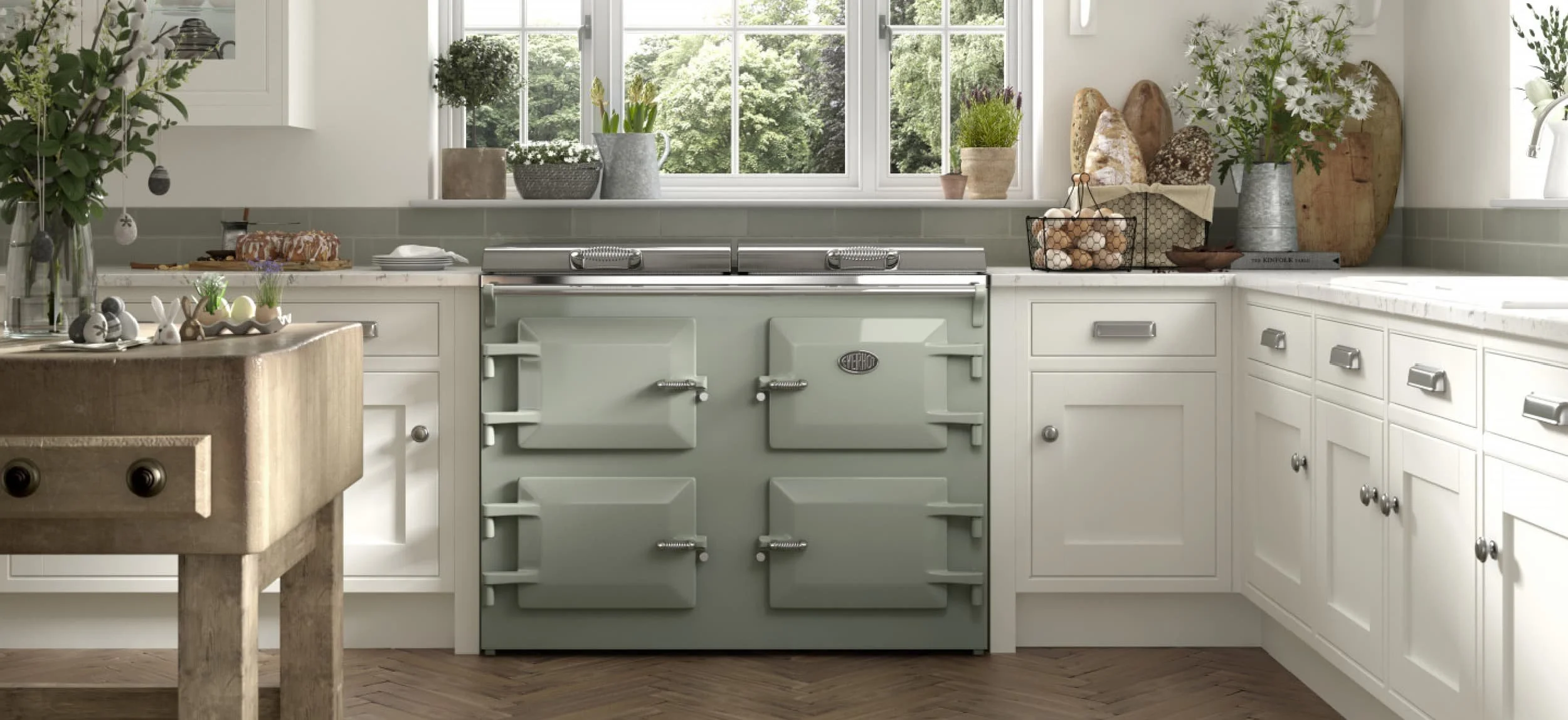 "Sage green Everhot electric range cooker in a country kitchen, supplied and installed by Bryony Richardson Interior Design in Jersey"