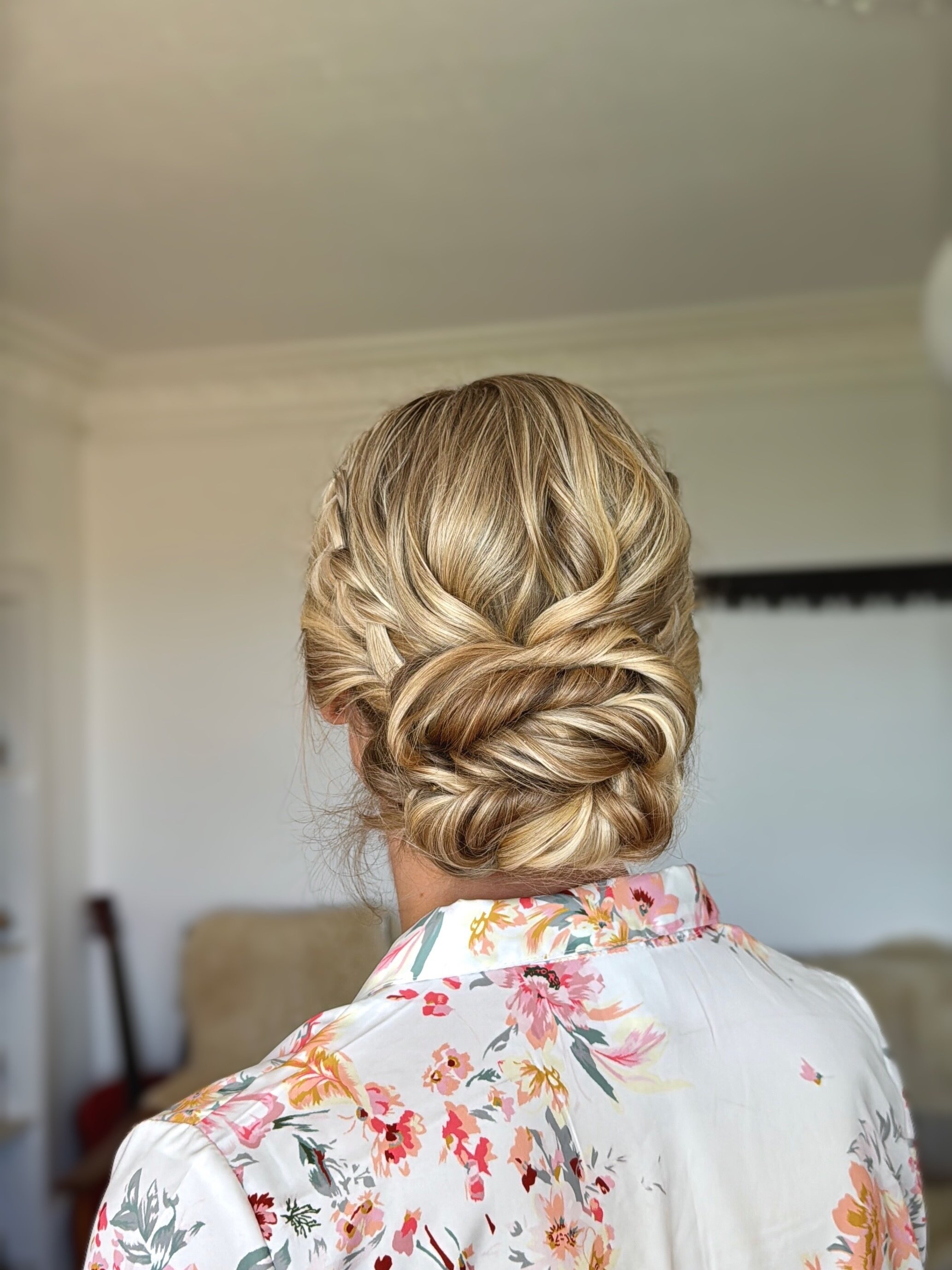 For the bride who wants her hair to look effortlessly beautiful rather than perfectly placed.

Soft twists, natural texture and a gently undone finish give this style that relaxed, lived-in feel. Romantic, modern and designed to move naturally throug