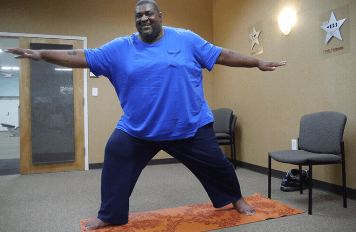 Ann Swansons’s client, Thomas Dawson, practicing yoga