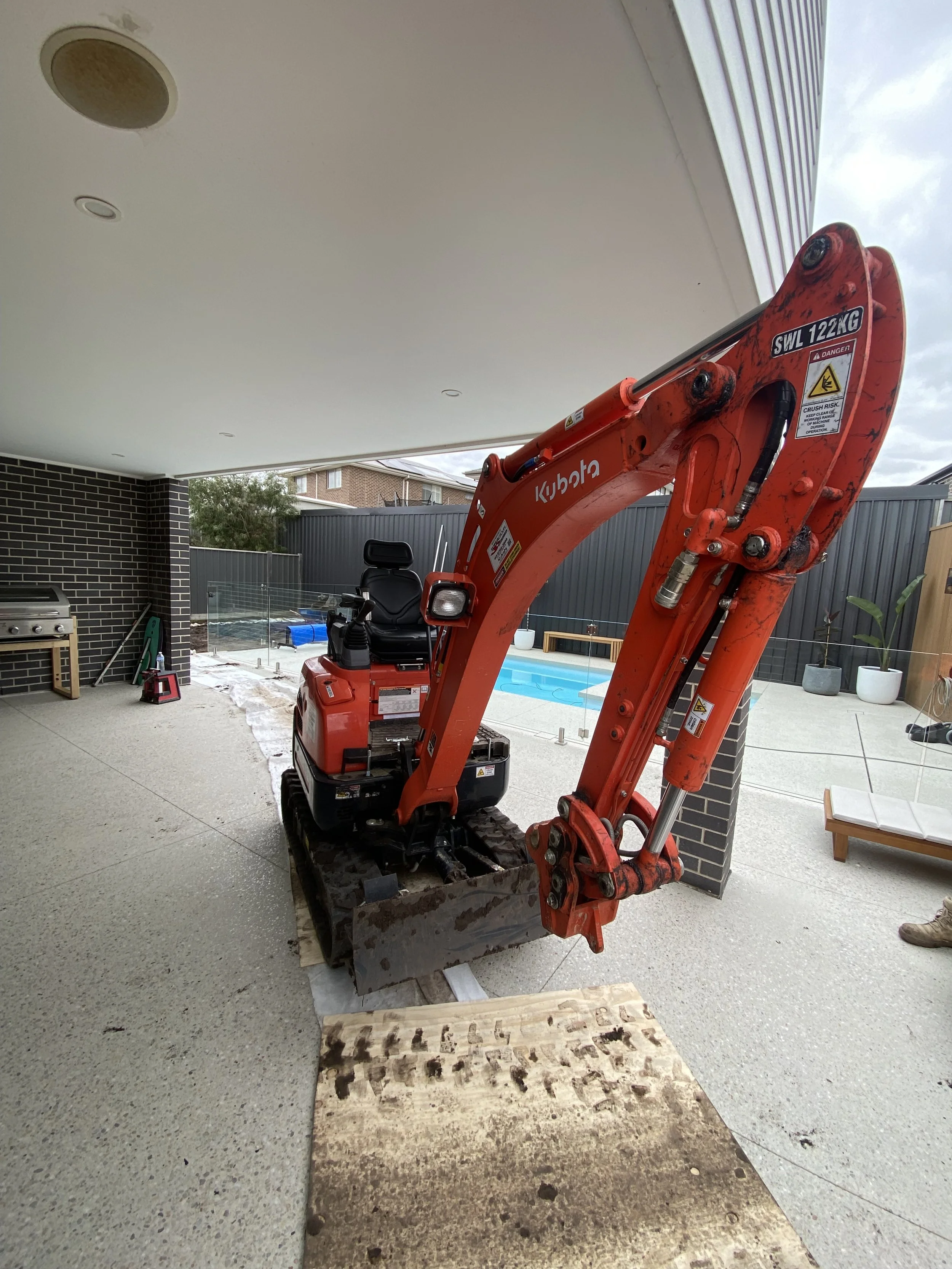 Tight access for pool excavation
