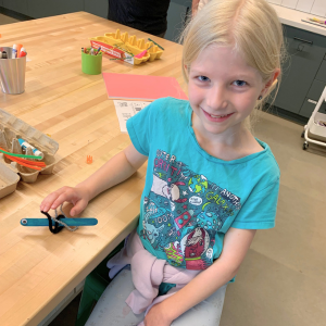 Girl smiling with pollinator project