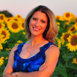 Jill Makovec Headshot amongst sunflowers