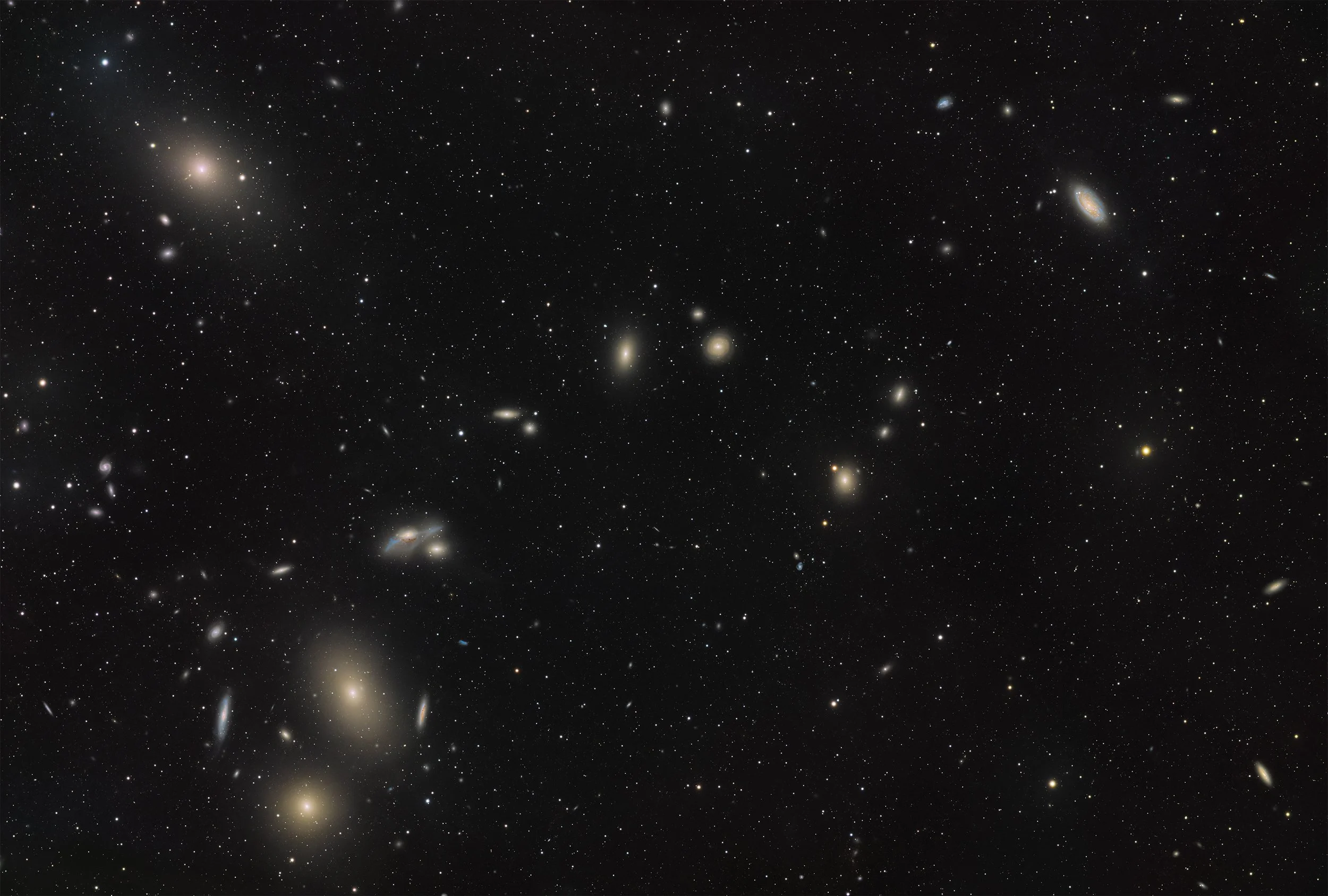 Markarian's Chain in Virgo – captured with a Sky-Watcher Esprit 100 at f/4.12 with ASI2600MM Pro camera and LRGB filters. Image by Cosmic Captures