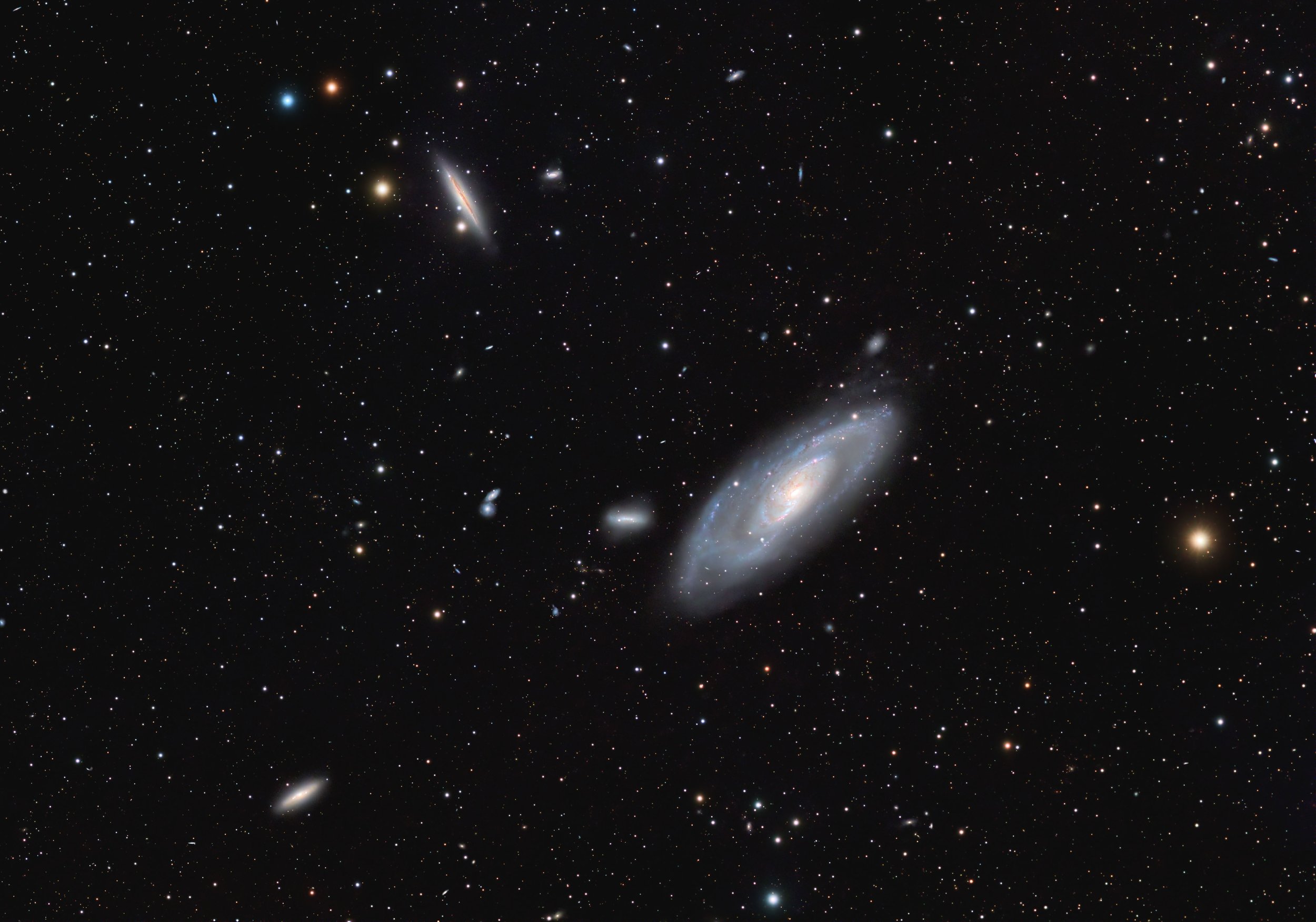 M106 – Widefield – captured with a Sky-Watcher Esprit 100 at f/4.12 with ASI2600MM Pro camera and LRGB filters. Image by Cosmic Captures