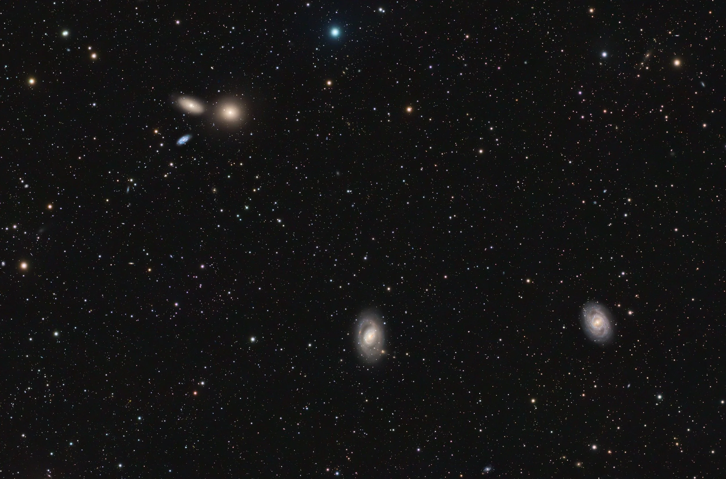 Wide field image with galaxies NGC 3384, M105, NGC 3389, M96 and M95 in Leo – captured with a Sky-Watcher Esprit 100 at f/4.12 with ASI2600MM Pro camera and LRGB filters. Image by Cosmic Captures