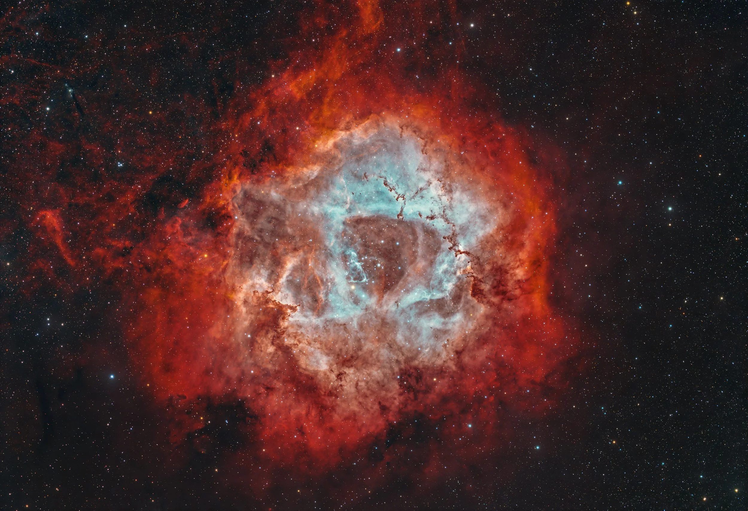 NGC 2237 – Rosette Nebula – captured with a Sky-Watcher Esprit 100 at f/4.12 with ASI2600MM Pro camera and LRGBHSO filters. Image by Cosmic Captures