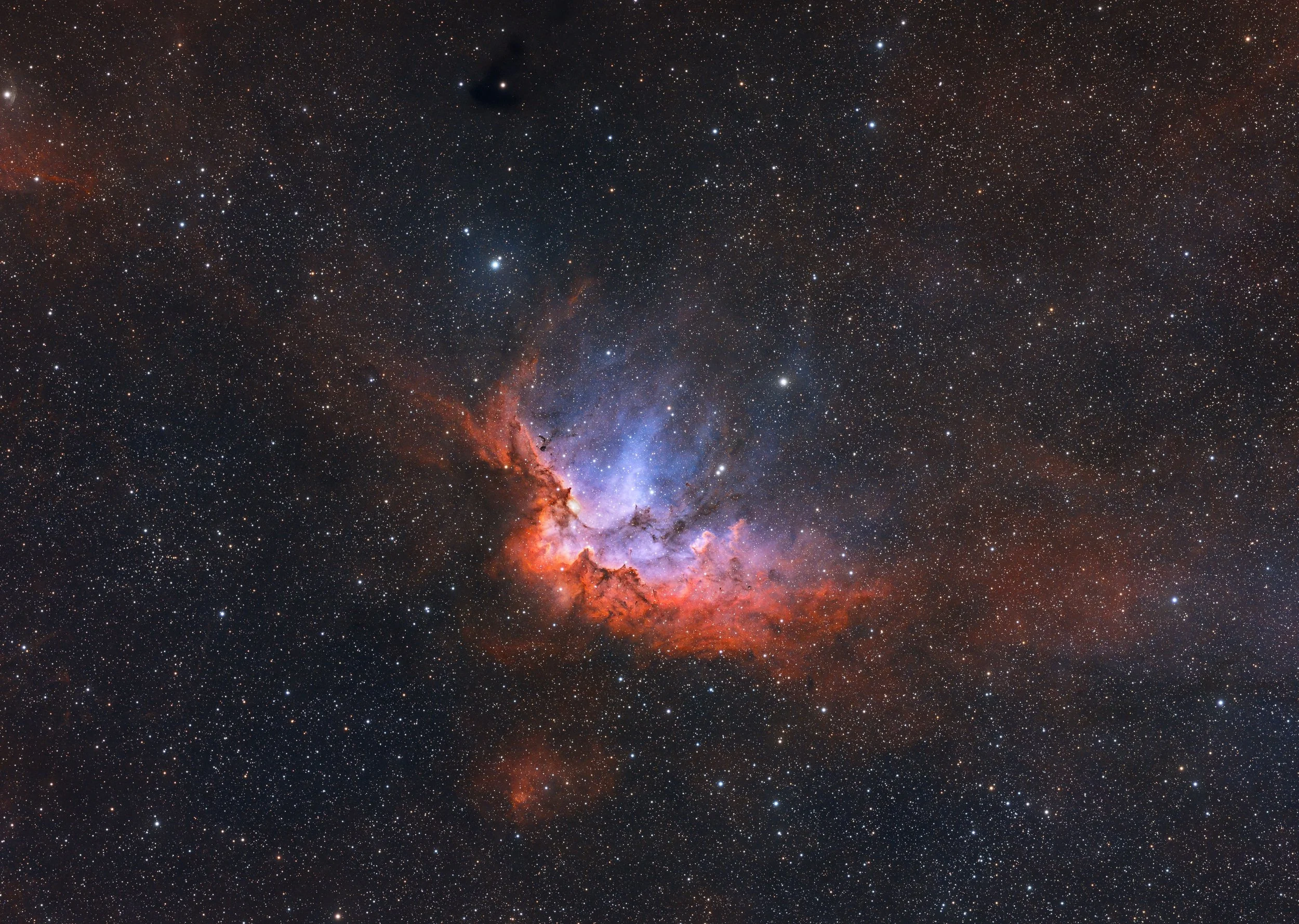 Sh2-142 – The Wizard Nebula – captured with a Sky-Watcher Esprit 100 at f/4.12 with ASI2600MM Pro camera and LRGBHSO filters. Image by Cosmic Captures