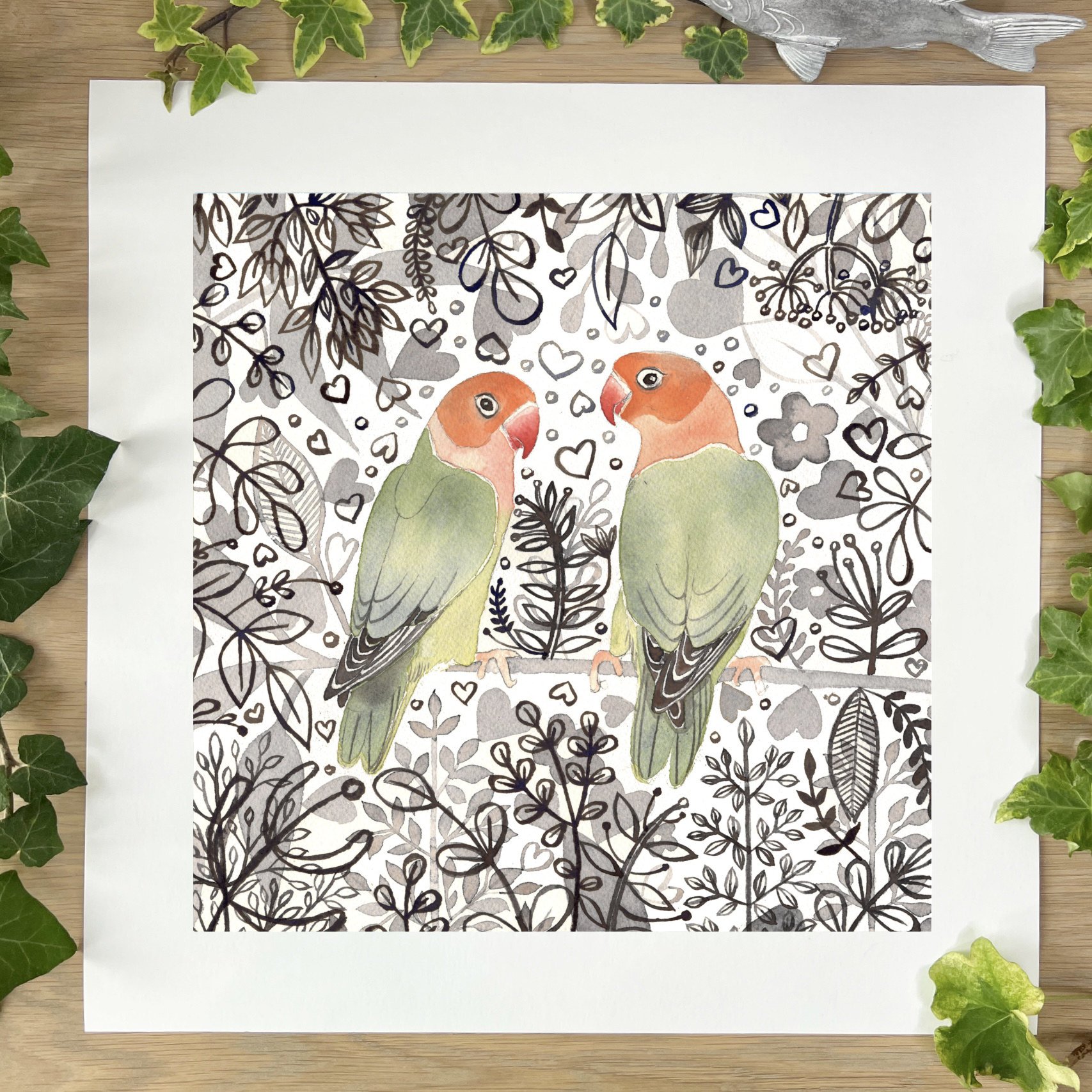 love birds wesbite image of print on table with ivy.jpg