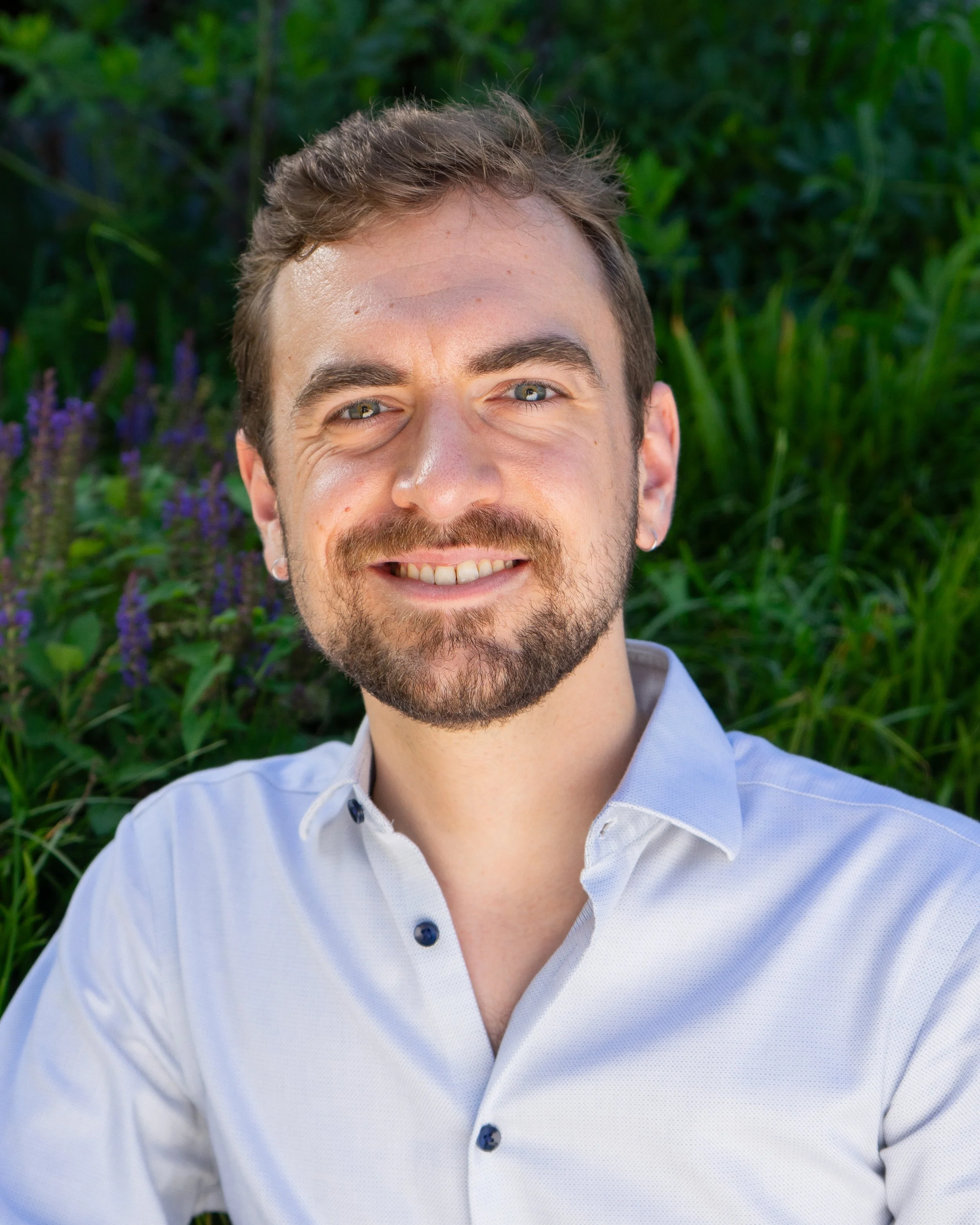 Colin Headshot (Flowers).jpg