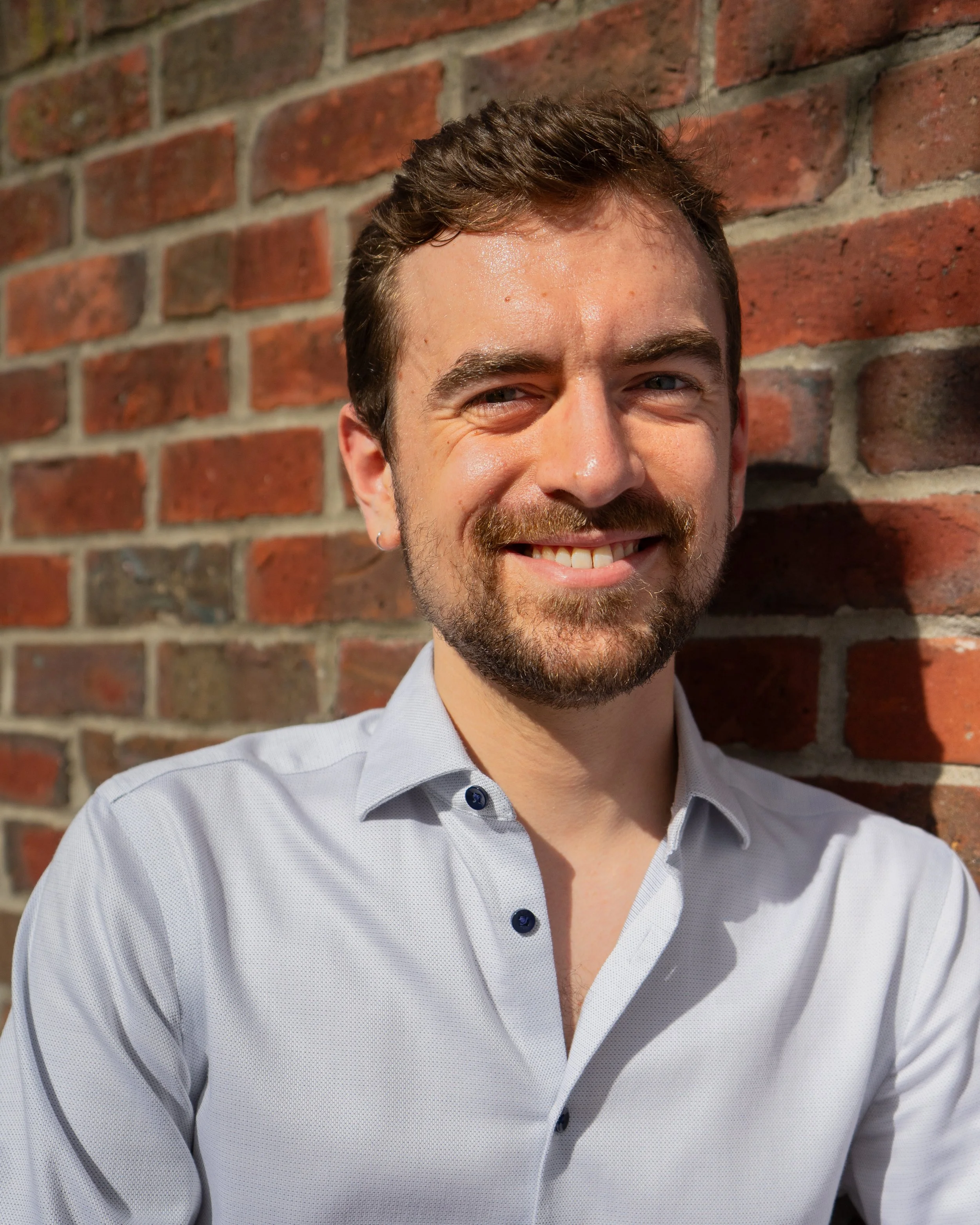 Colin Headshot (Bricks 2).jpg