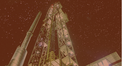 Upward view of a rocket launch pad, and the starlit sky.