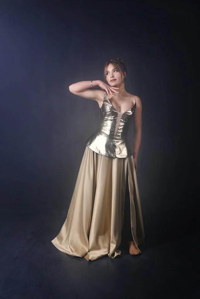 goddess corset dress Velvet that hugs like night, gold that glows like old-world royaltytwo looks, one unapologetically glamorous vibe Perfect for ballrooms, grand parties, and owning every room you enter. Golden Eagle Goddess Corset/ Dress