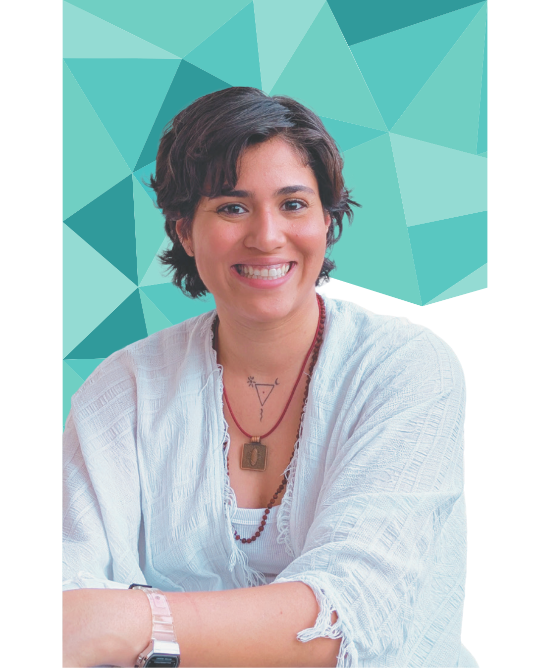 Portrait of a smiling woman with short dark hair, wearing a white blouse, colorful necklace, and a wristwatch, against a blue geometric background.