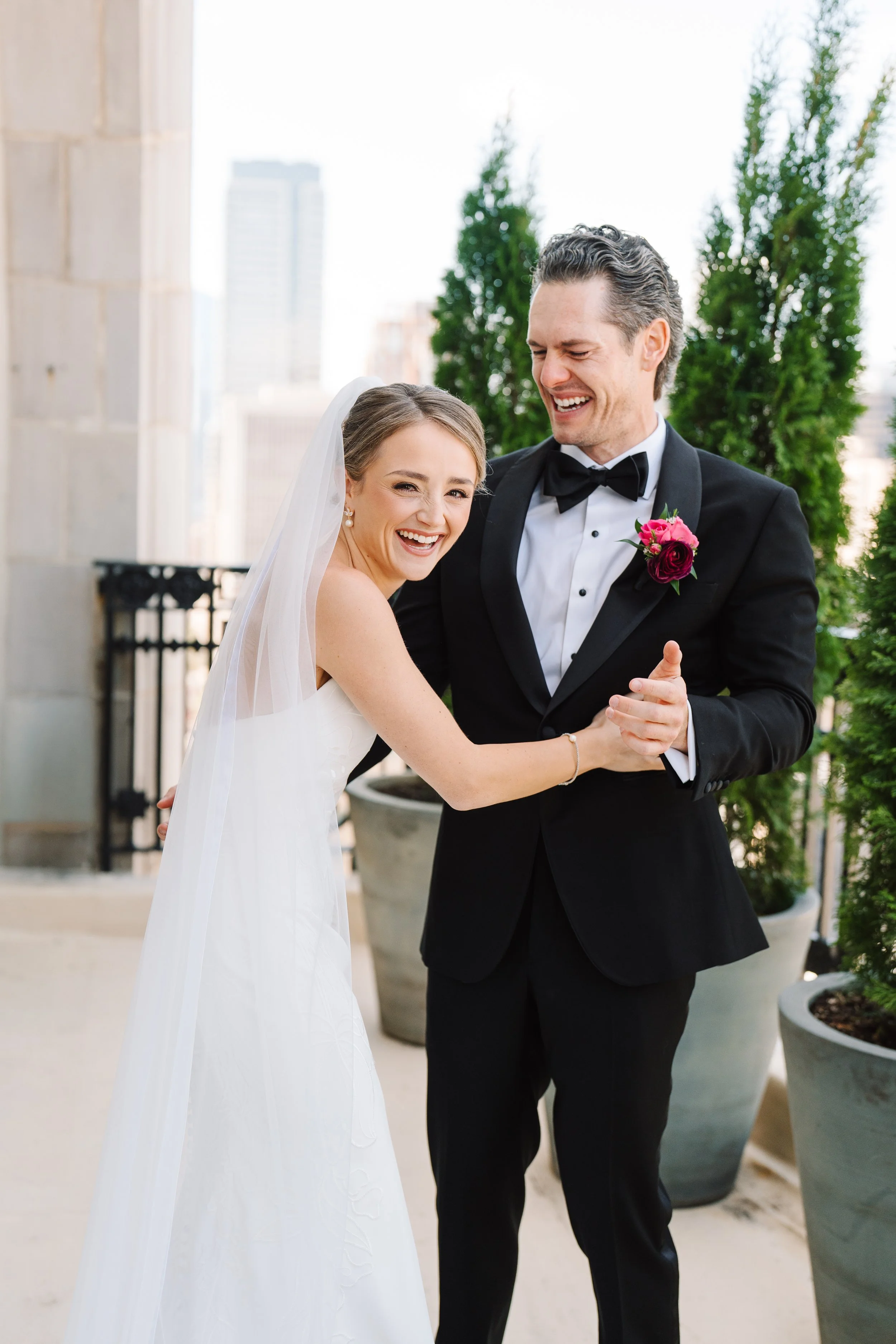 Bride and groom laugh at their first look at XIX in Philadelphia