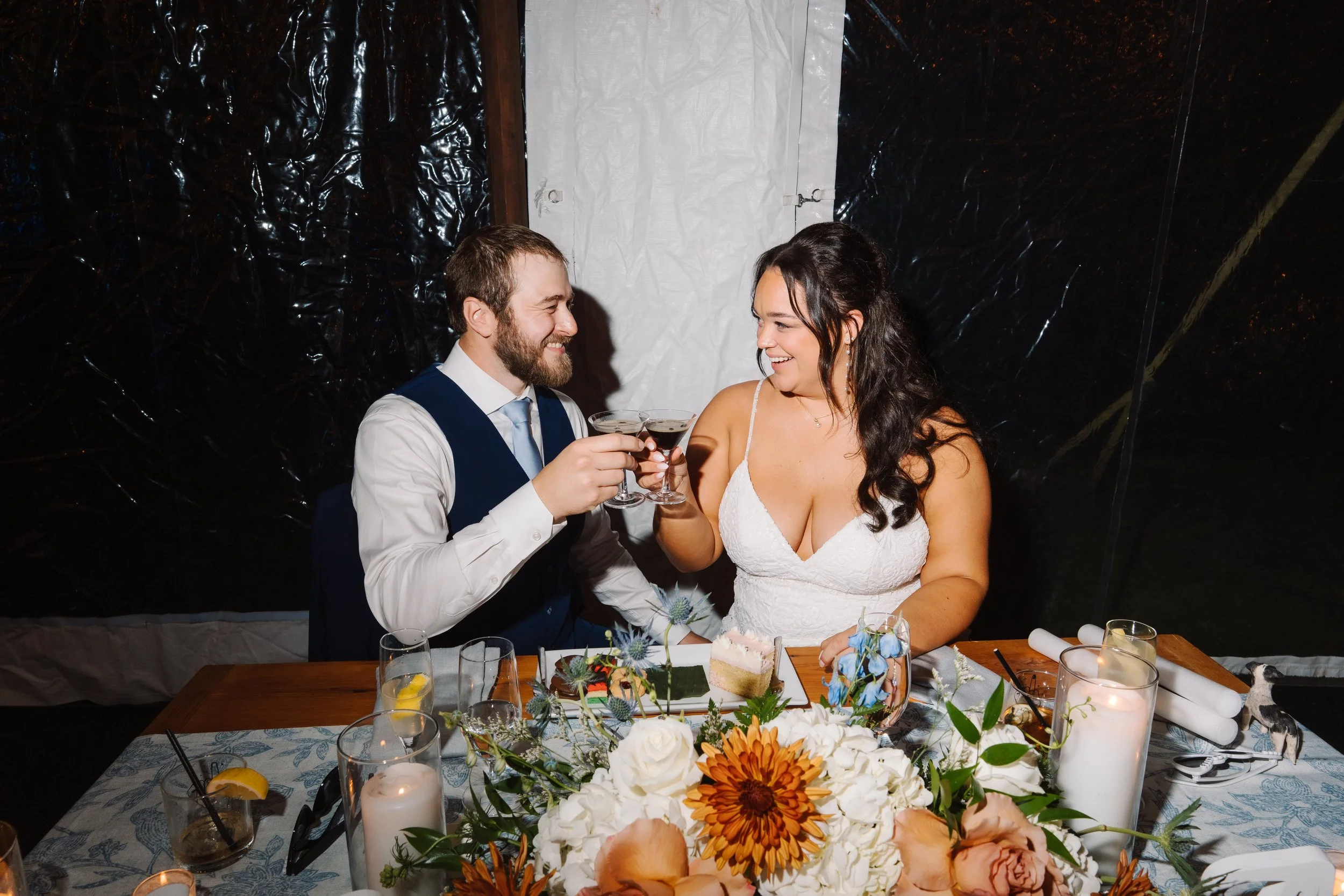 Bride and groom having a cheers at their wedding reception.