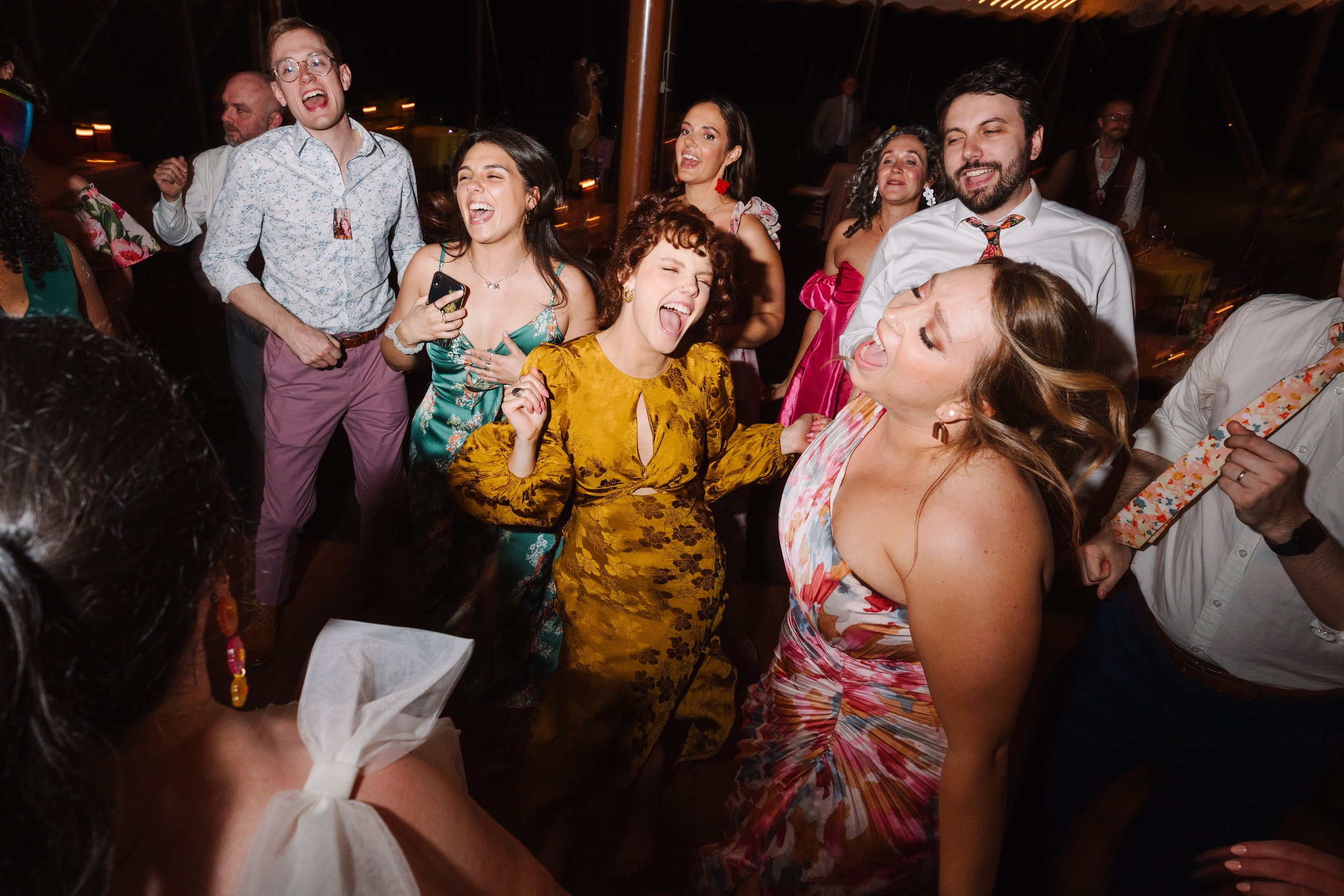 Guest dancing at wedding reception.