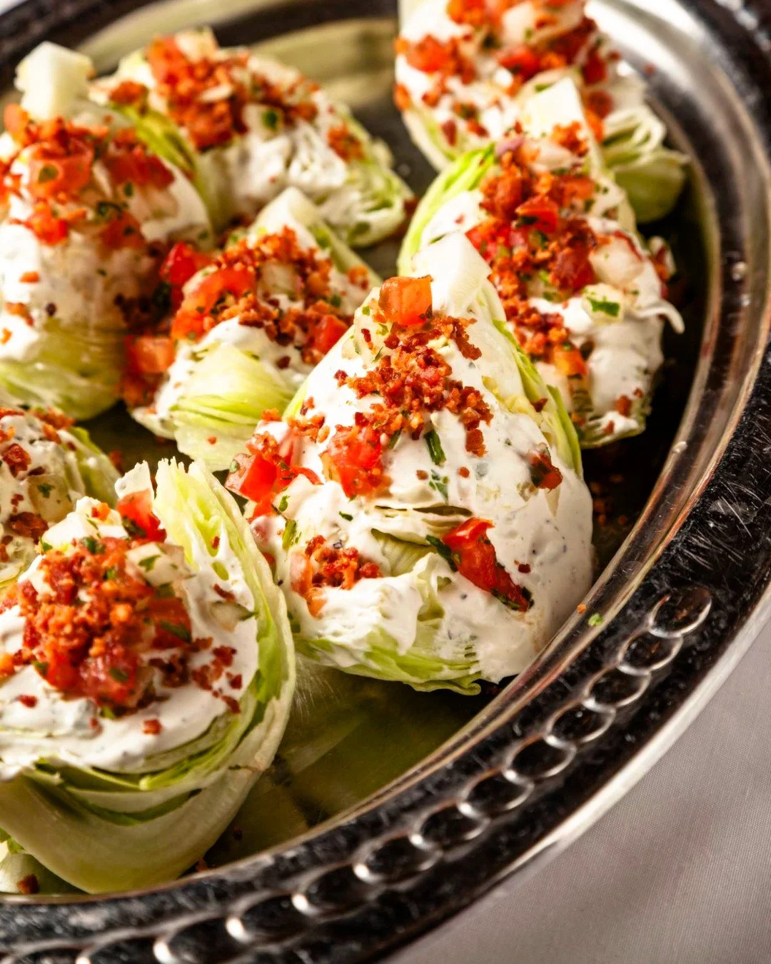 Crisp romaine, rich bleu cheese, savory bacon, and ripe tomatoes come together in our Bleu Cheese Wedge. A timeless start to your dining experience or a perfect pairing with a crafted cocktail at the bar. 🥗🍸

#ChamaGaucha  #LuxuryDining #Steakhouse