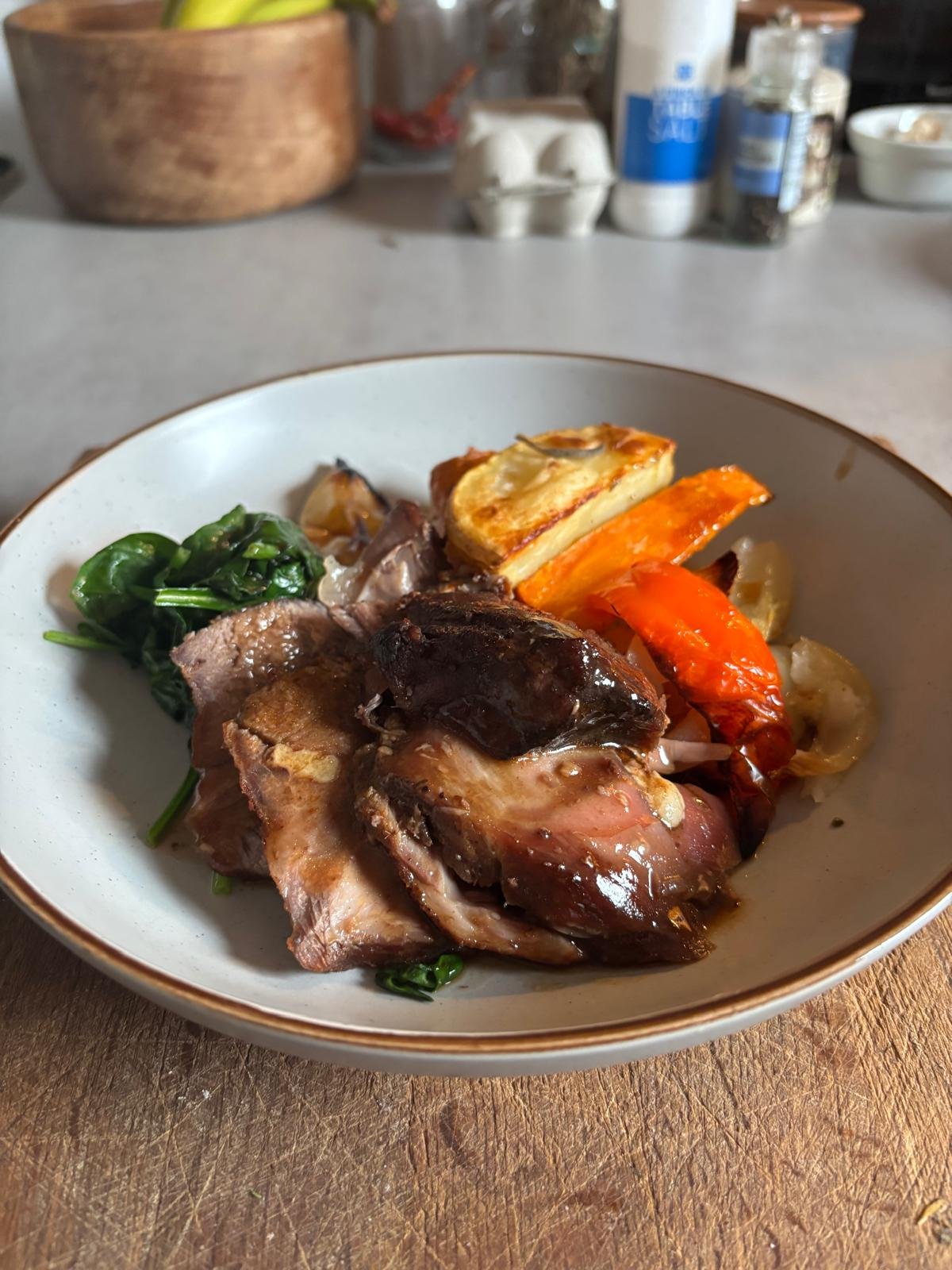 Roast goat shoulder with roast vegetables