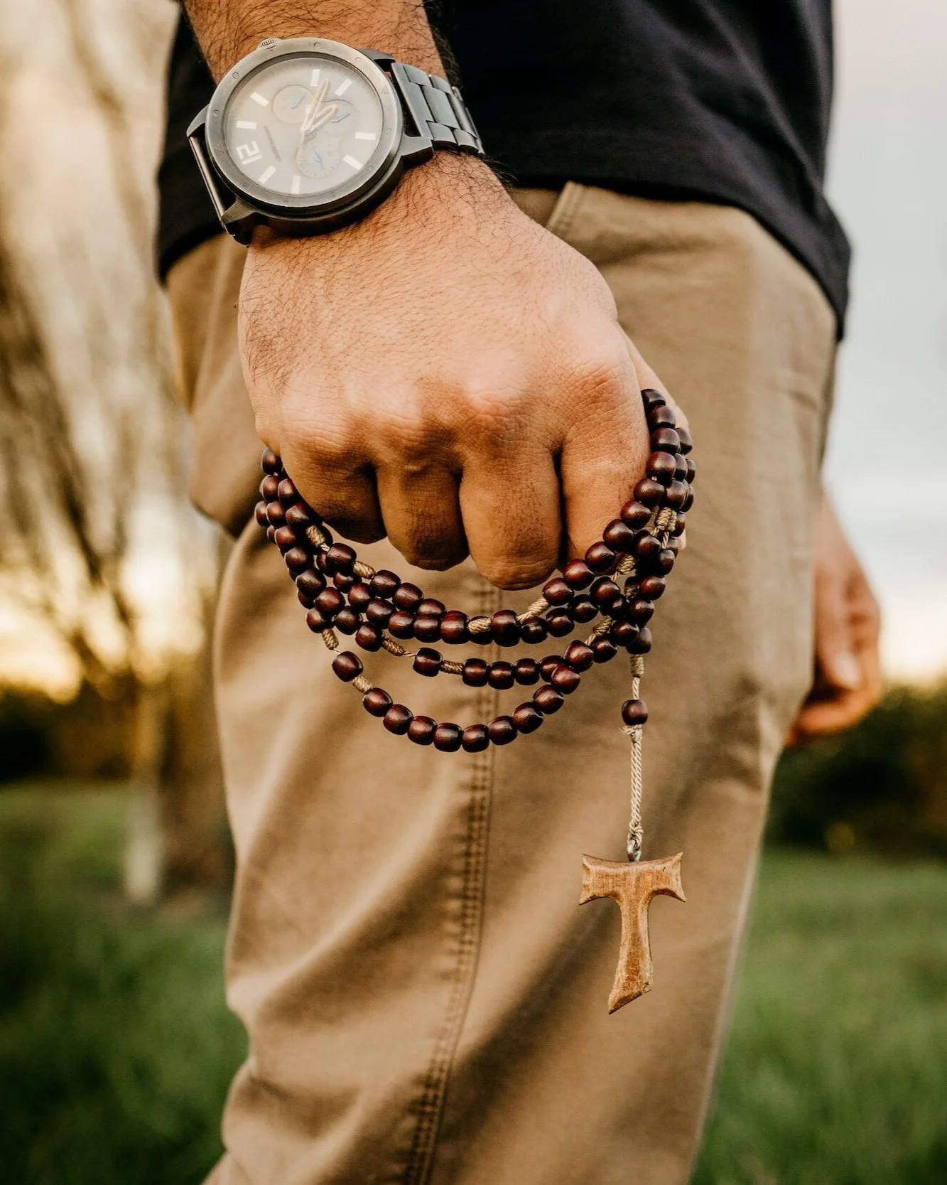 Man with rosary Catholic therapy near Minneapolis MN