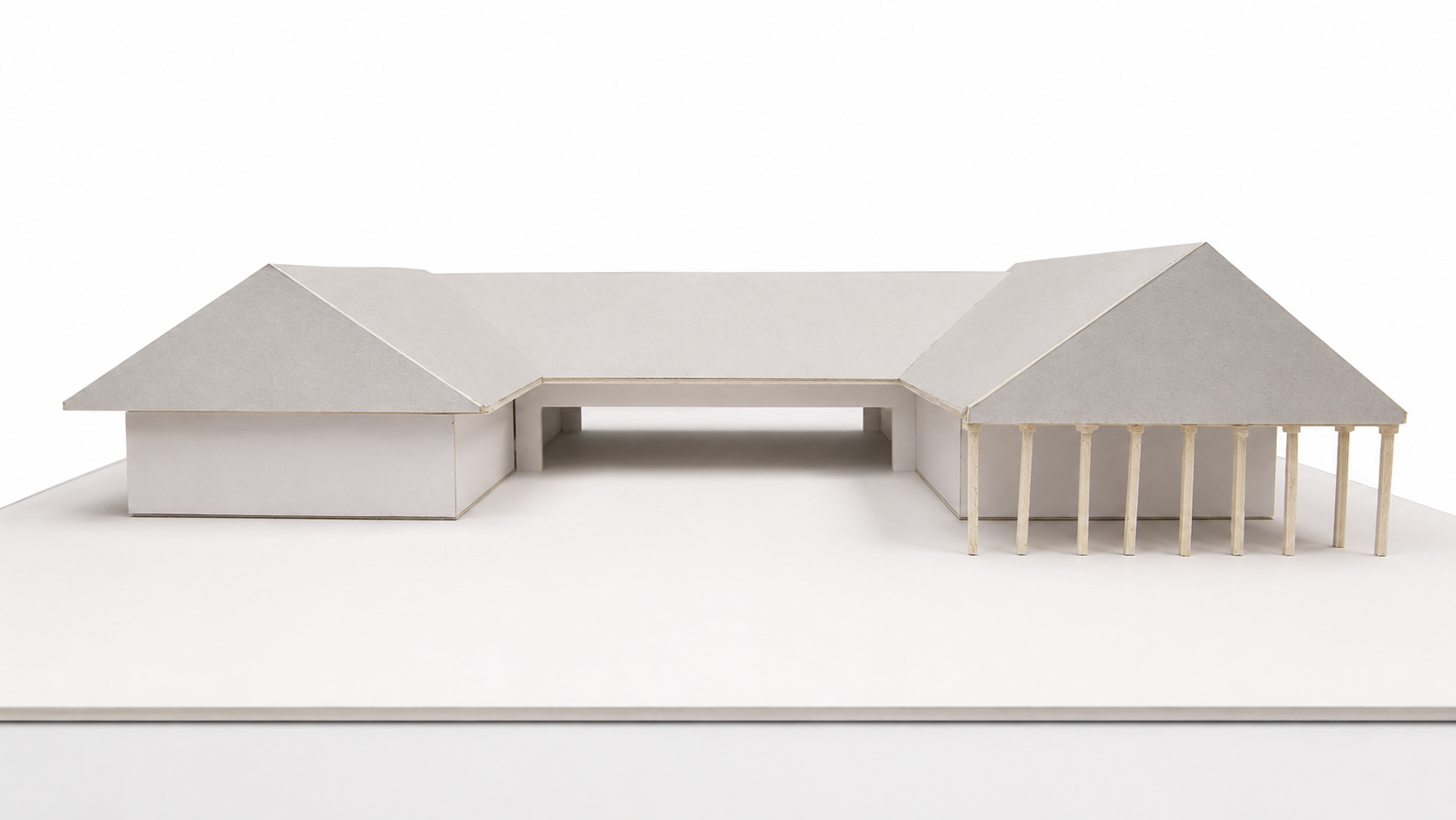 Perspective view of an early architectural concept model illustrating building massing, roof forms, and spatial organization.