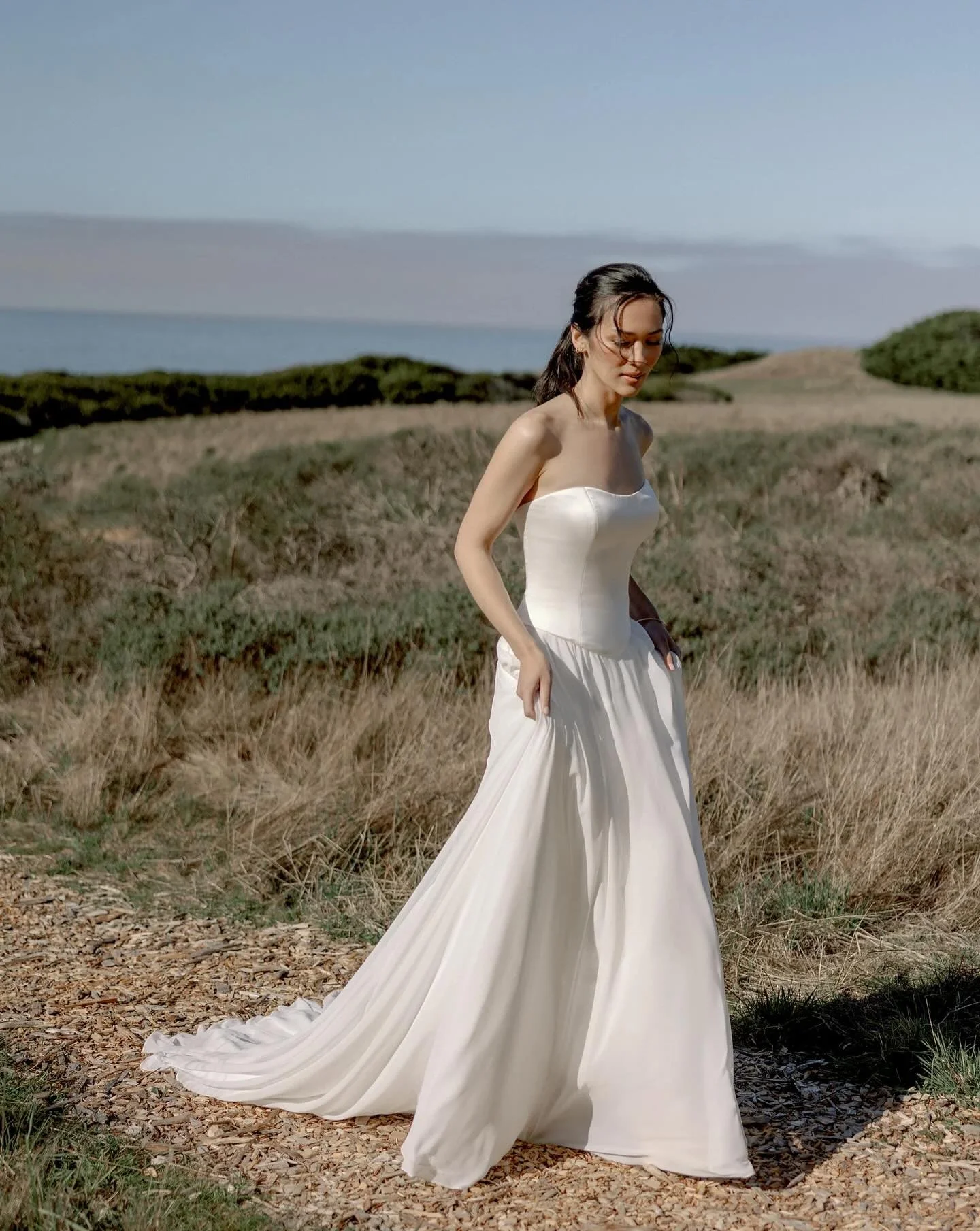 The simplicity and structure of this brand new Adore gown is top tier. With a satin charmeuse bodice, it gives a timeless hourglass silhouette.

Come try on Cordelia in-store!

#weddinggown #adorebyja #satinweddingdress #classicweddingdress #elegant 