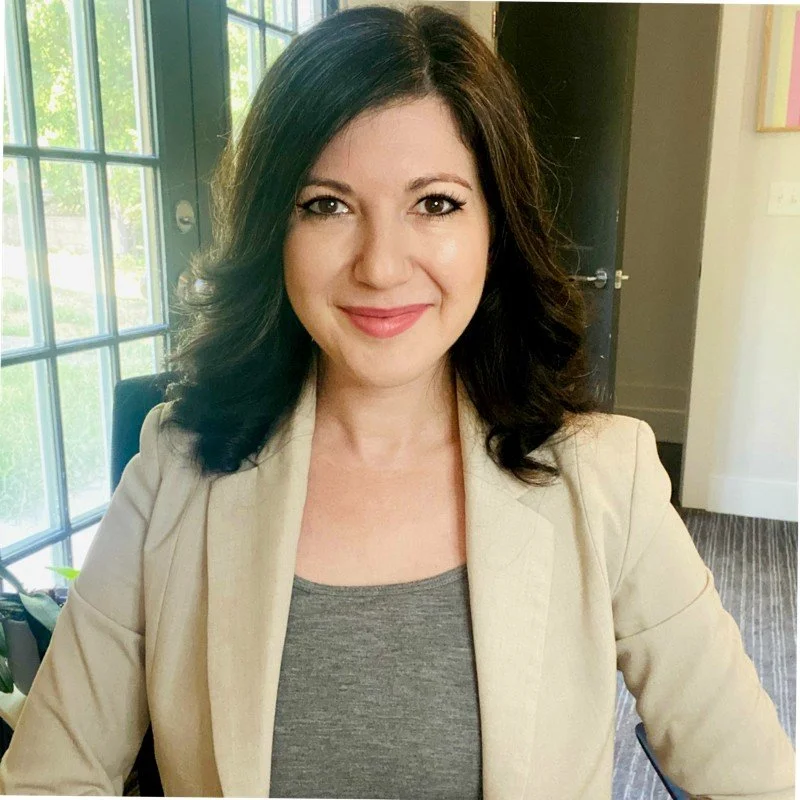 Laura Bellis, Executive Director at Take Control Initiative smiling into camera