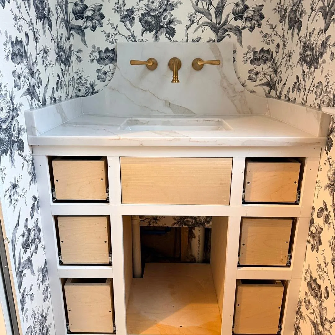 We love the way this bathroom vanity turned out with the tapered backsplash. This was with our Calacatta Dome Quartz. 

The customer sent us a picture of how she wanted the backsplash to look and we delivered!