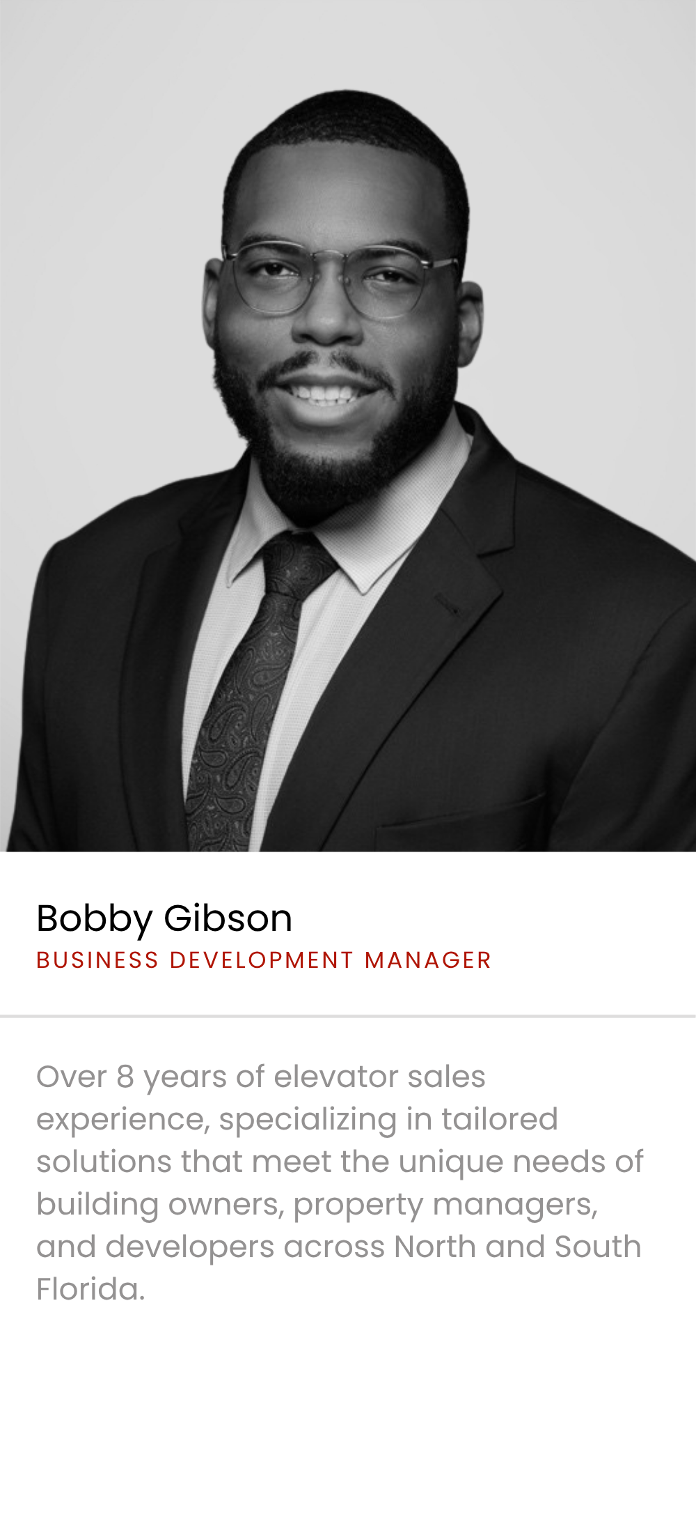 Professional headshot of Bobby Gibson, a Black man with short hair, beard, and glasses, wearing a suit and tie, smiling against a plain background. The text identifies him as a Business Development Manager with over 8 years of elevator sales experience.