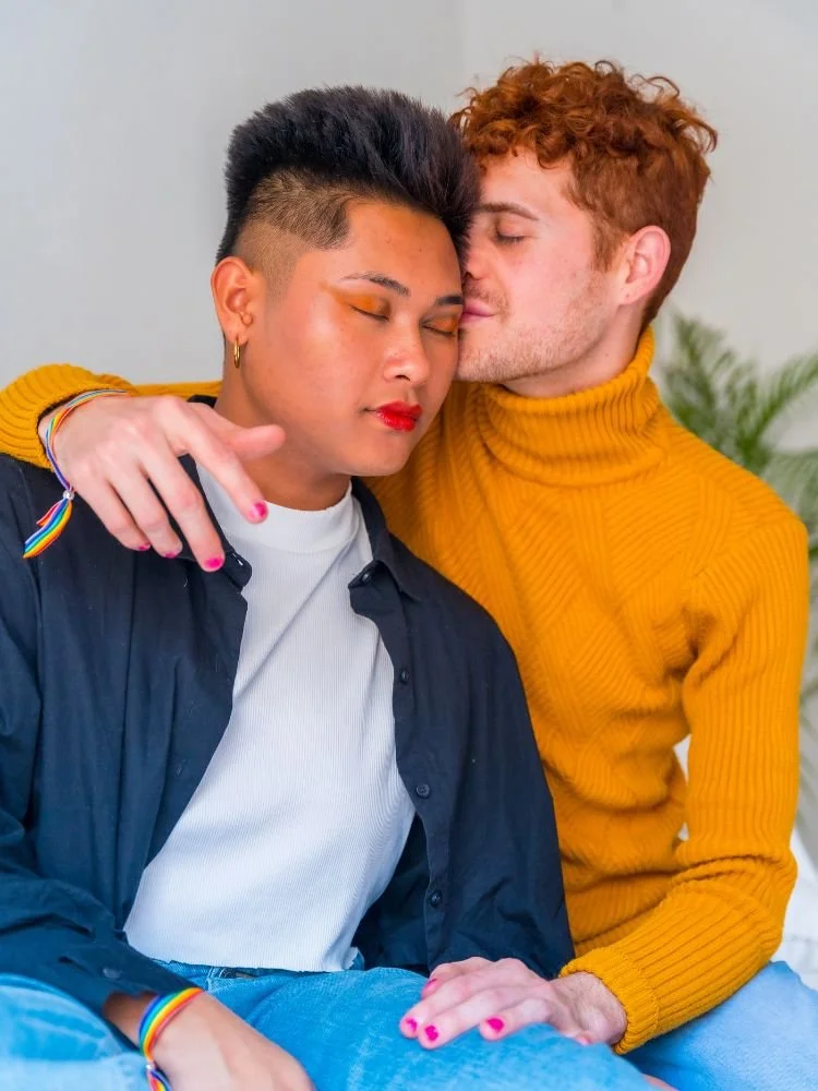 Queer couple hugging