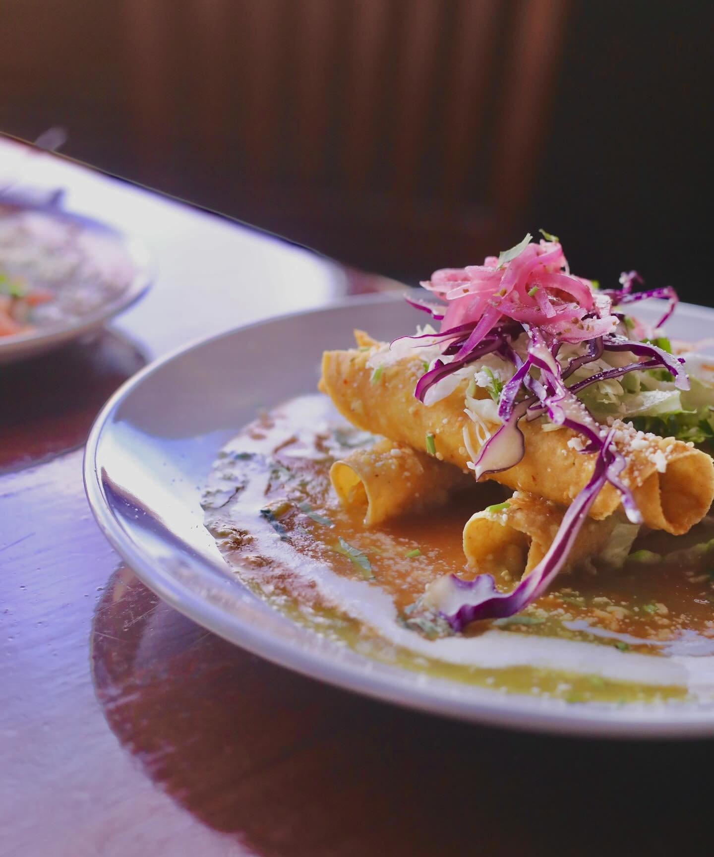 What are you having for lunch today? We&rsquo;re diving into some delicious Flautas! Pollo rolled into corn tortillas and fried crisp, topped with house salsas, shredded romaine, shaved cabbage, crema, cotija, pickled onion, and cilantro. Come on by 
