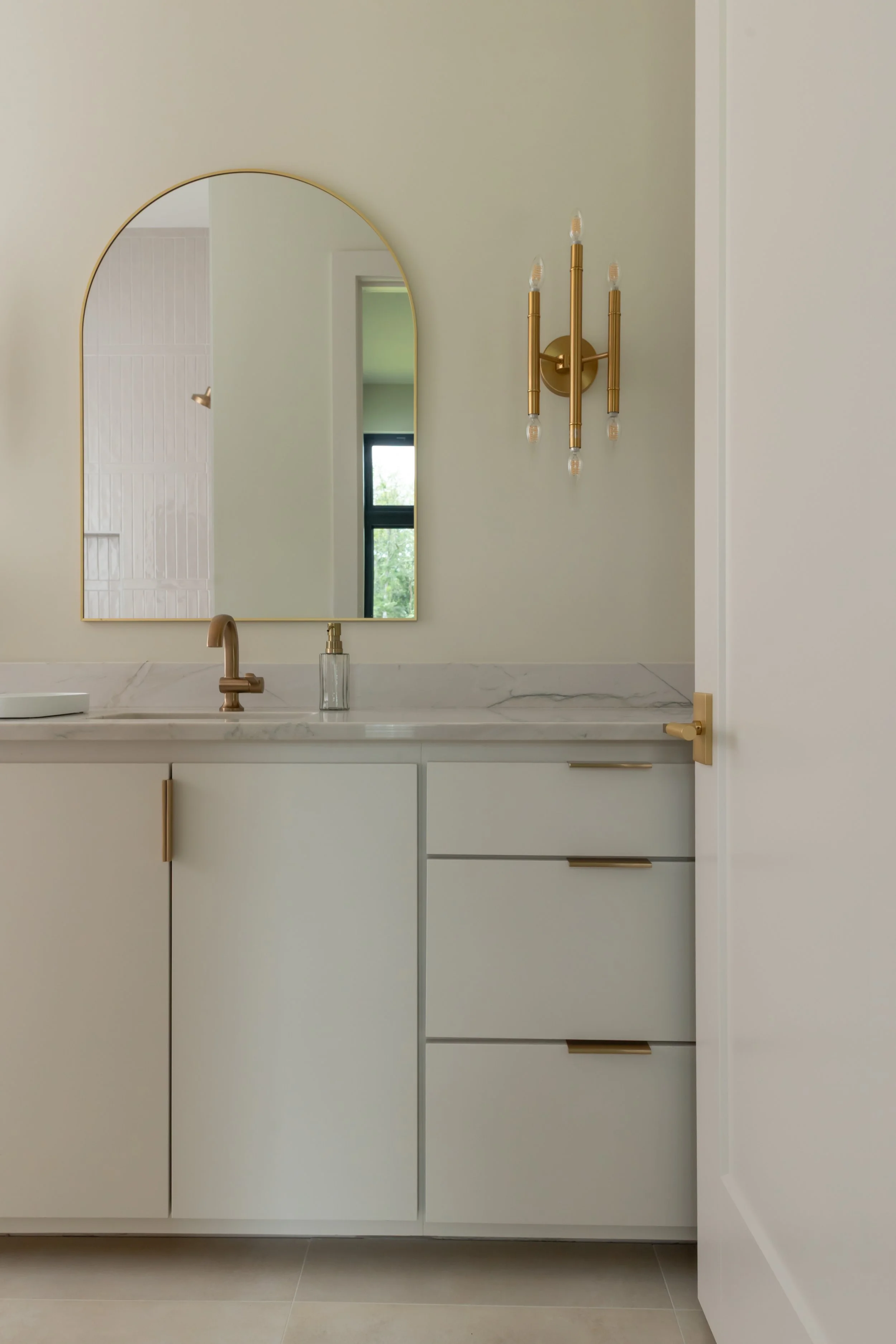 dantin-builders-signature-home-denham-springs-la-modern-powder-bathroom-marble-sink-01.jpg