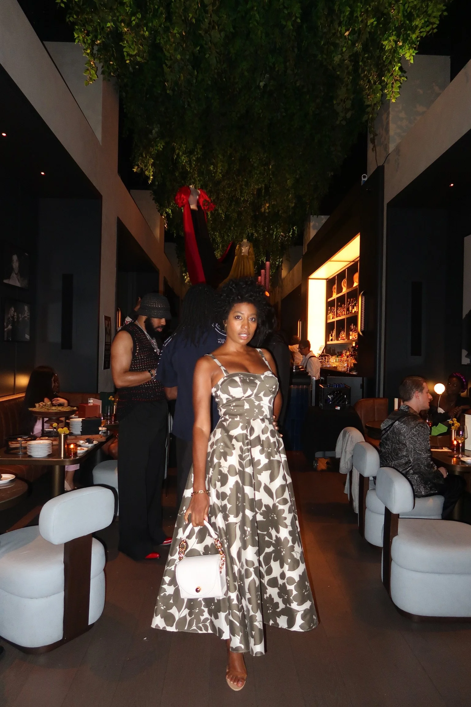 Guest posing at the afterparty 