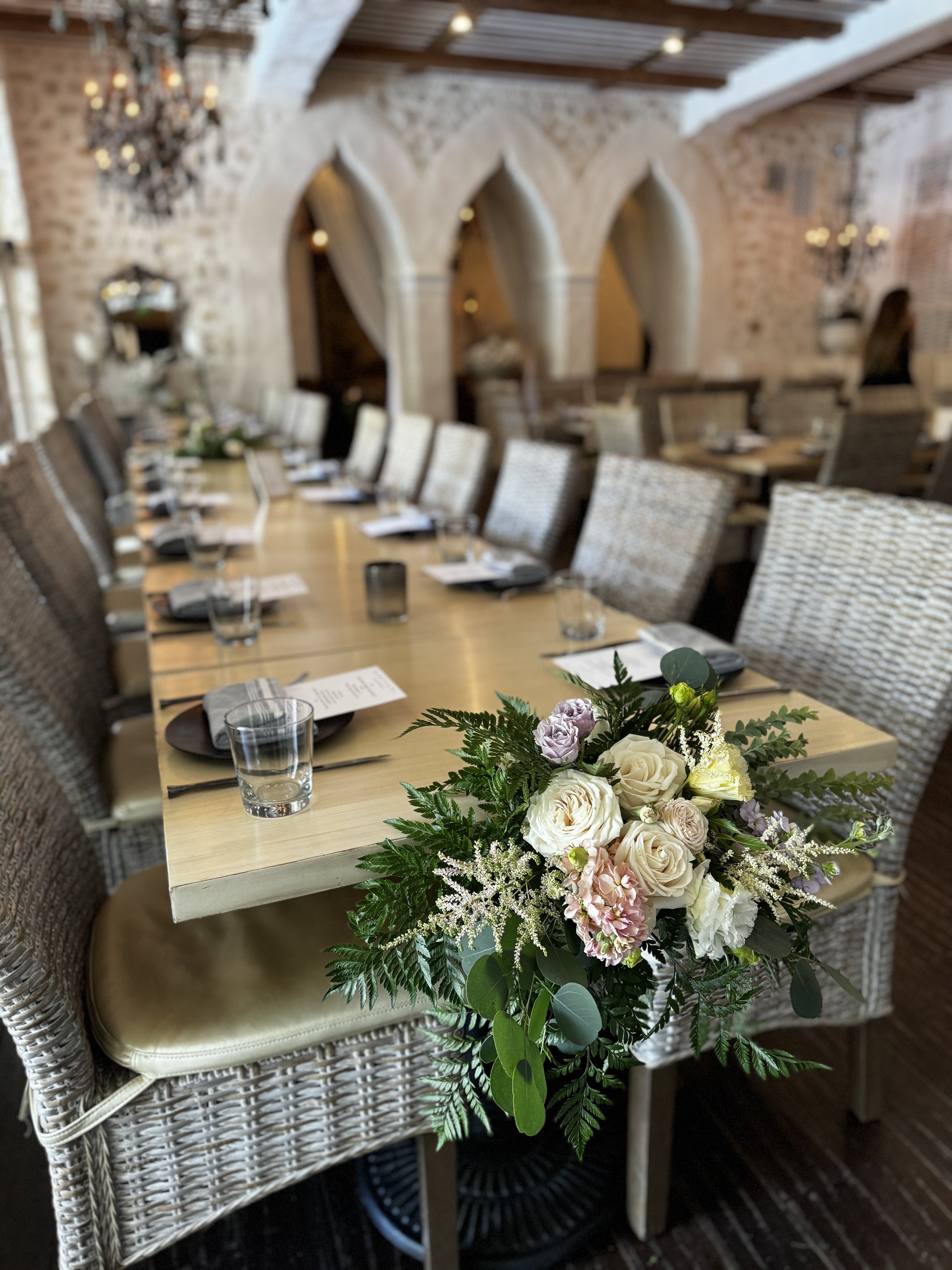 Creative Centerpieces for a Wedding at Santuari in Burbank to accomodate a family-style meal service.