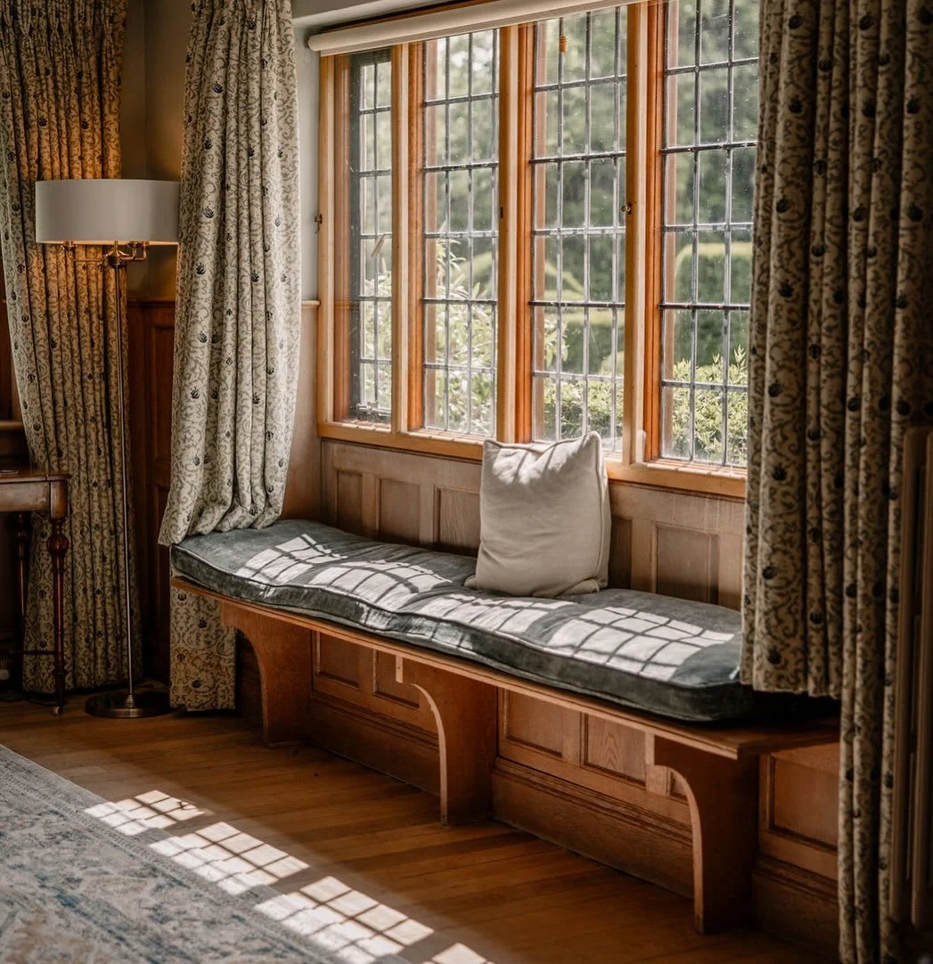 The perfect sunny reading nook, tucked inside the walls of this 500 year-old manor. 

#ukstaycations
#shorehalluk
#airbnbuk 
#luxuryholidays 
#staycationuk