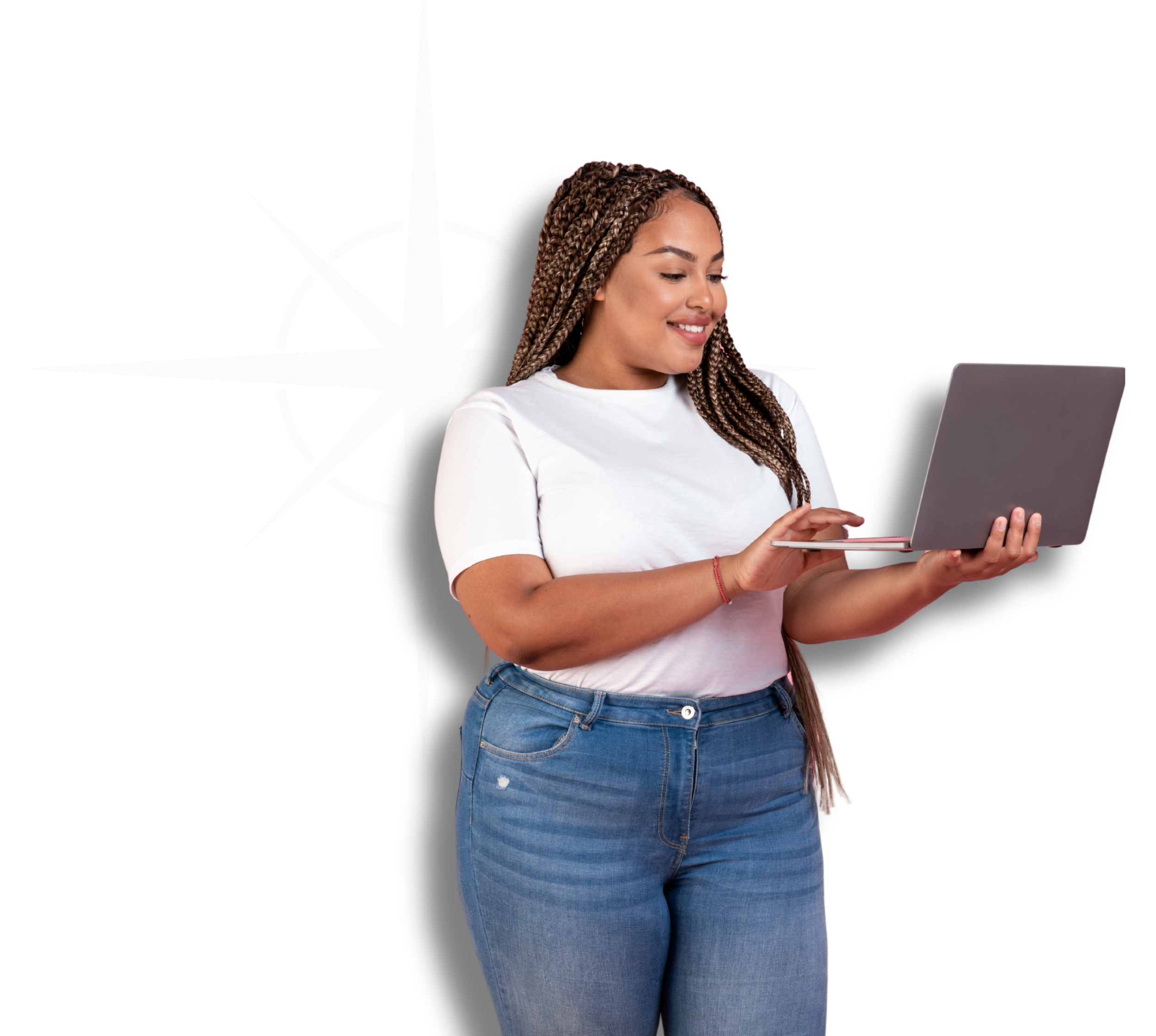 A young woman with braided hair wearing a white t-shirt and blue jeans, holding a laptop, standing in front of a black background with a white compass design.