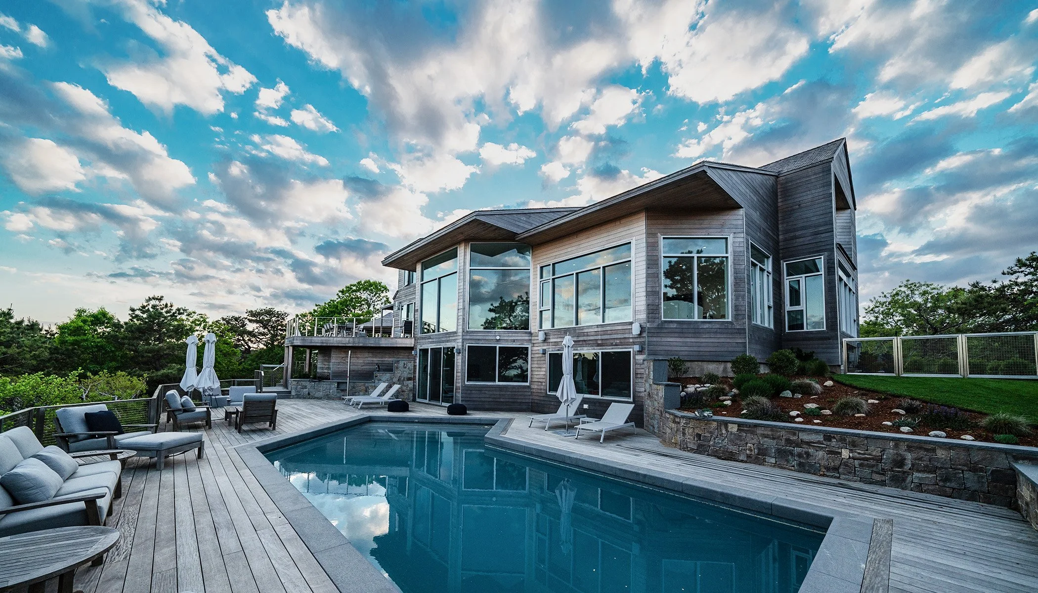 modern beach house pool area professional photograph for interior design brochure